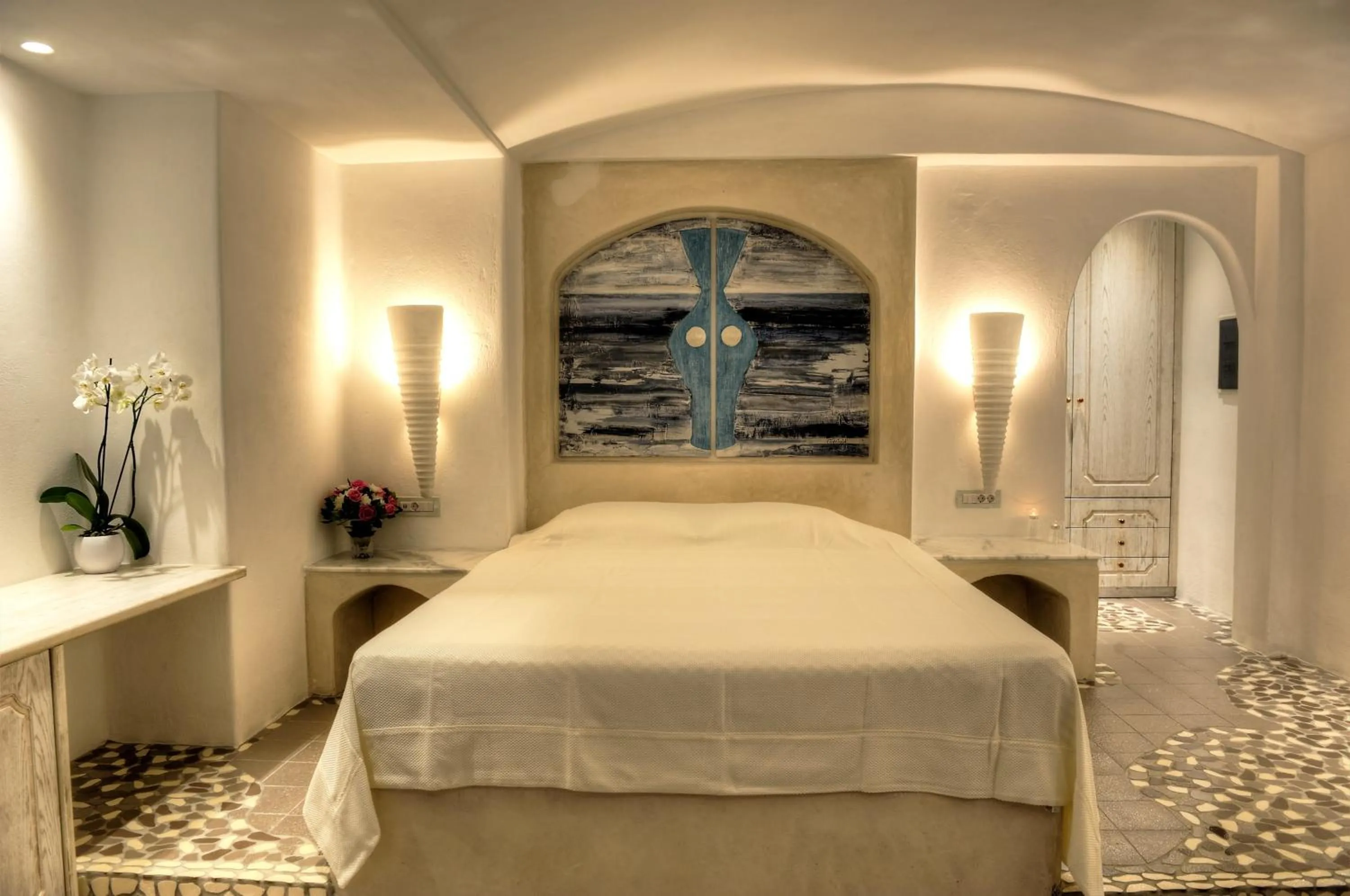 Bed in Astarte Suites
