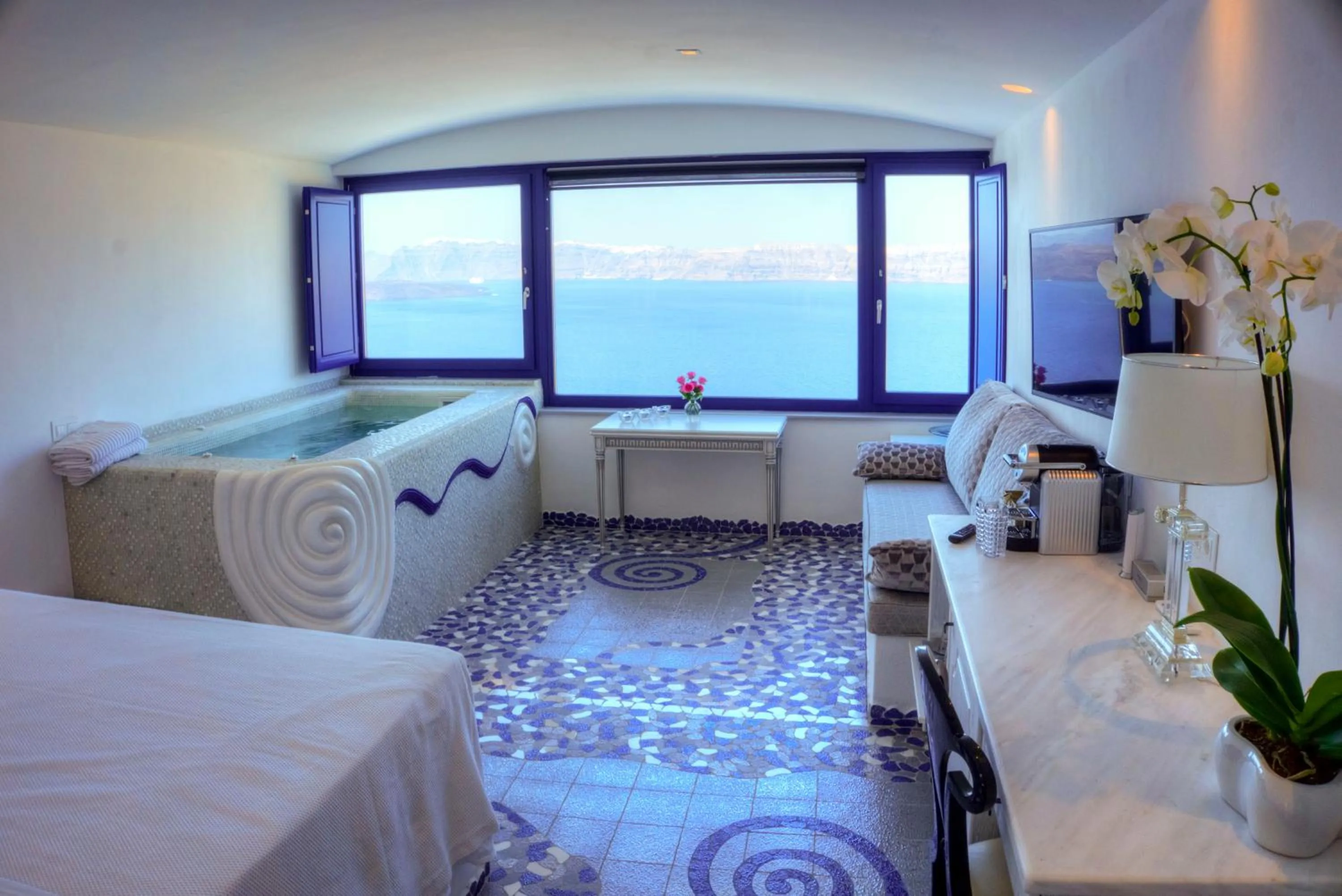 Bed in Astarte Suites