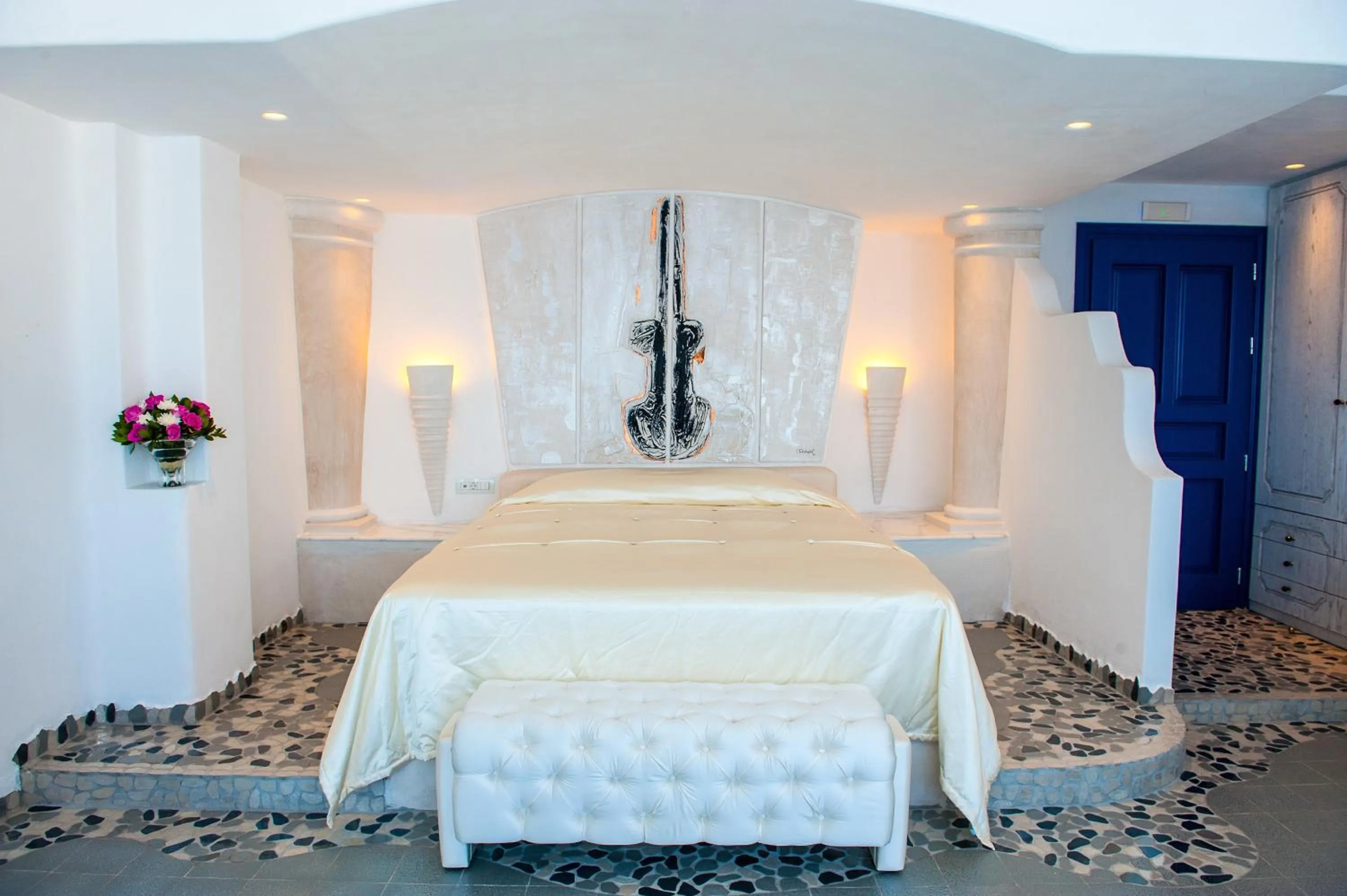 Bed in Astarte Suites