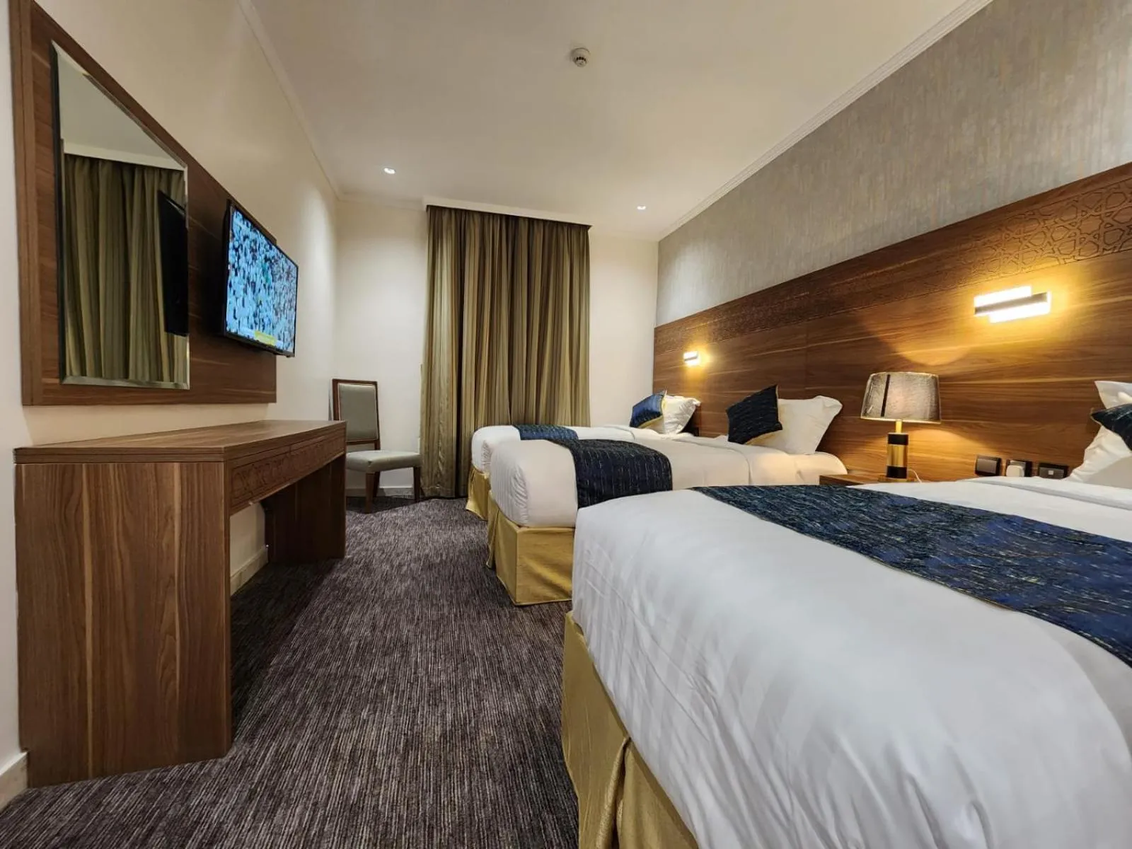 Bed in Rowaa Al Azizia Hotel