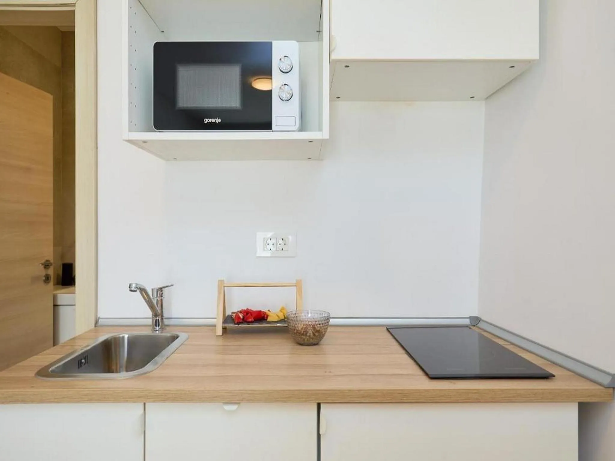 Kitchen or kitchenette in Palm Tree Apartments