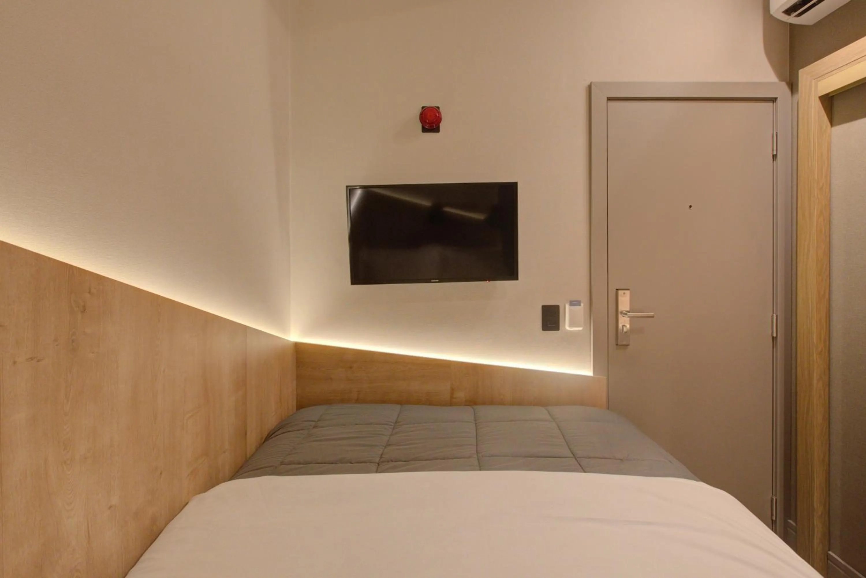 Bed in Fast Sleep Suites by Slaviero Hoteis - Hotel dentro do Aeroporto de Guarulhos - Terminal 2 - desembarque oeste