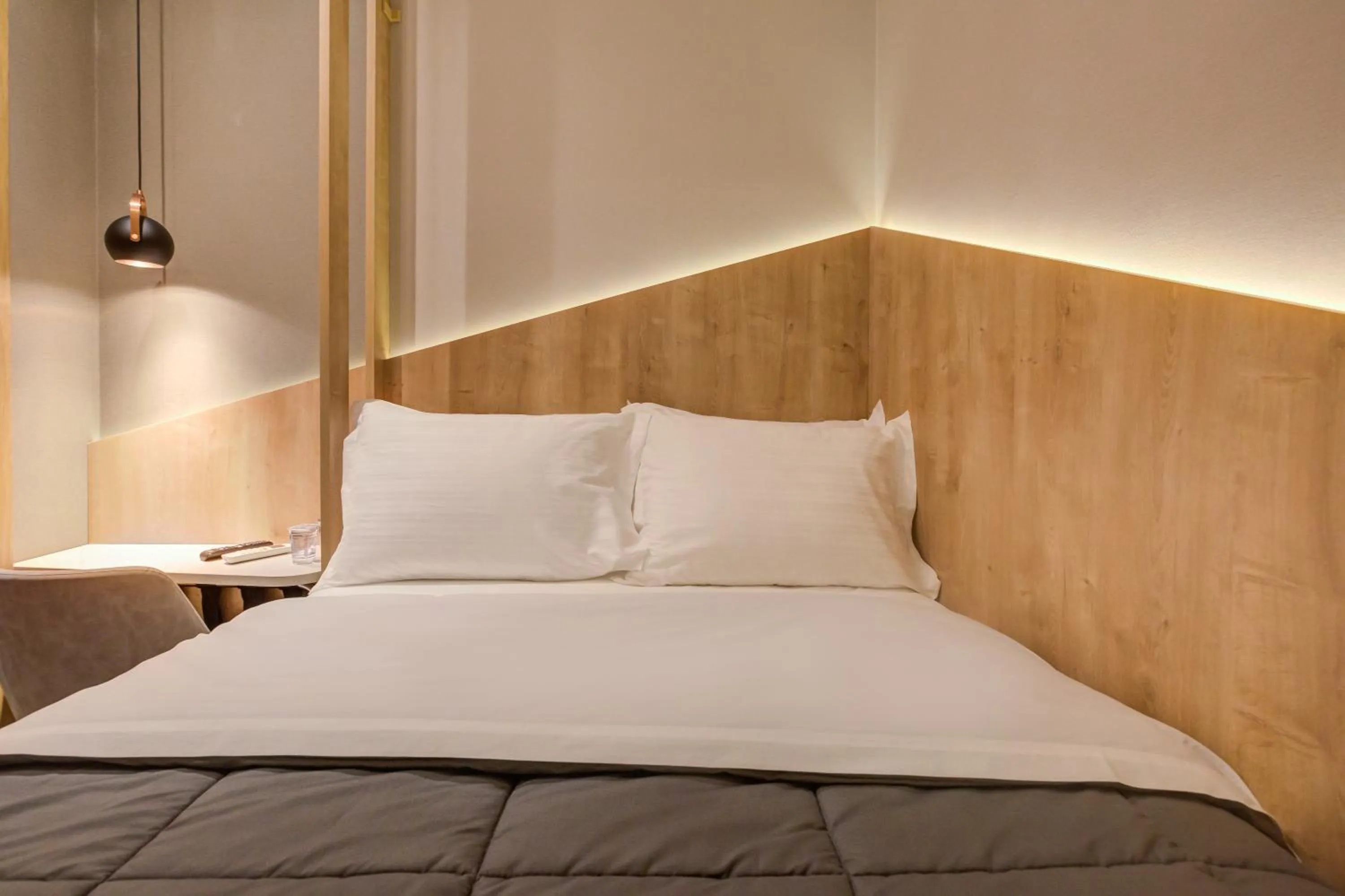Bed in Fast Sleep Suites by Slaviero Hoteis - Hotel dentro do Aeroporto de Guarulhos - Terminal 2 - desembarque oeste