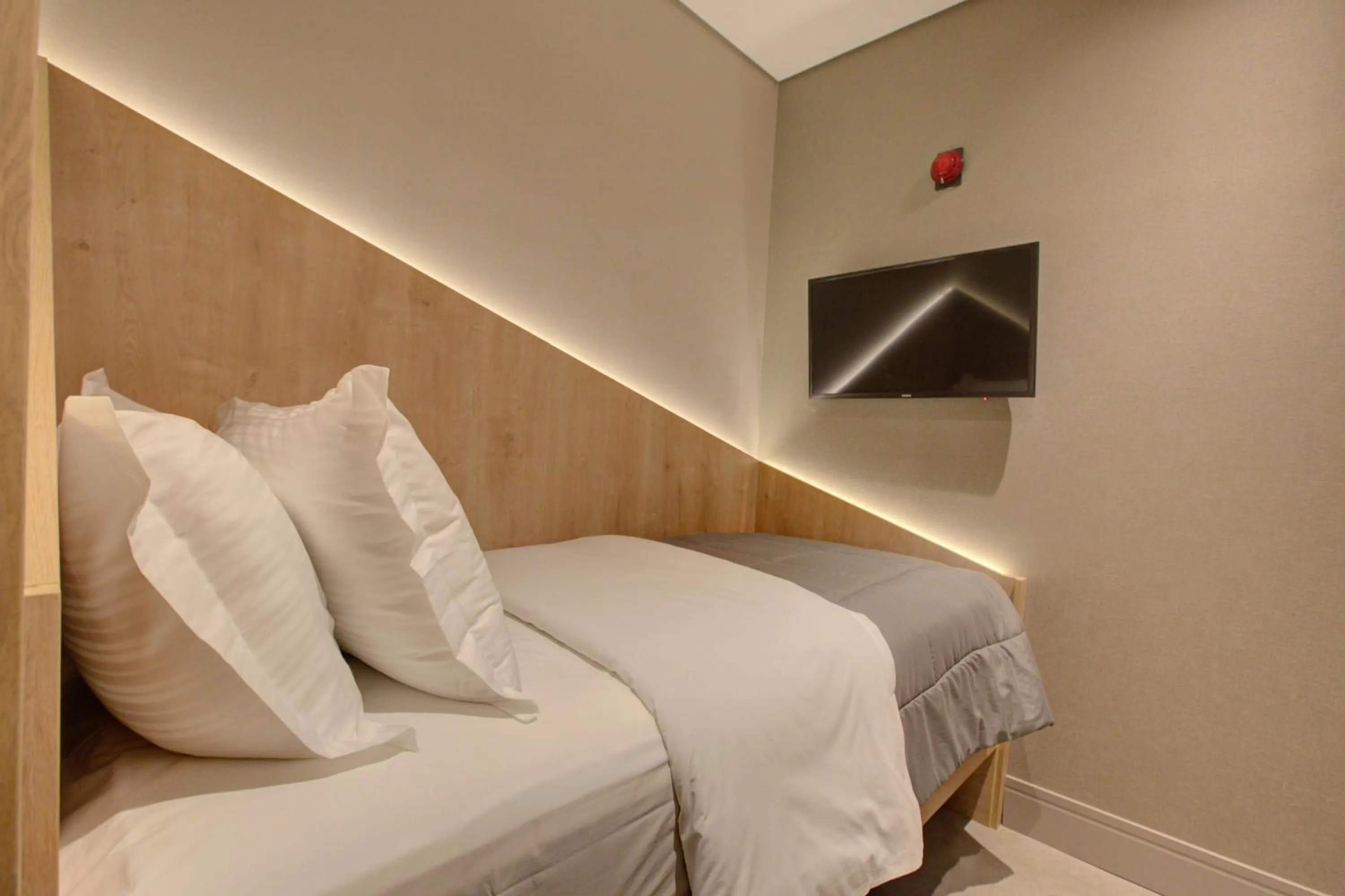 Bed in Fast Sleep Suites by Slaviero Hoteis - Hotel dentro do Aeroporto de Guarulhos - Terminal 2 - desembarque oeste