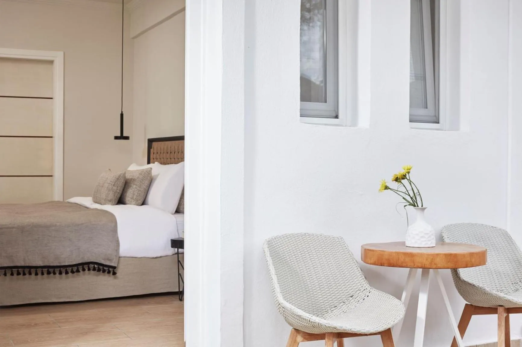 Bed in Loizos Stylish Residences