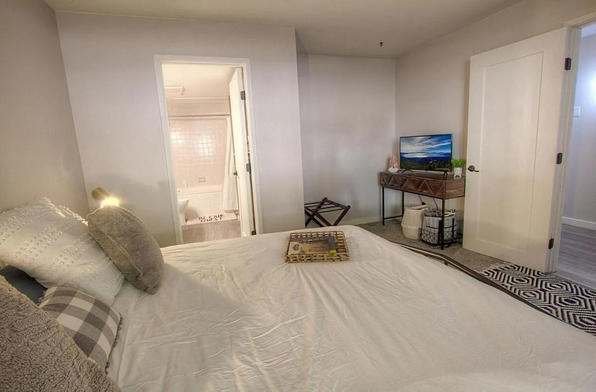 Bed in Taste of Burgundy condo