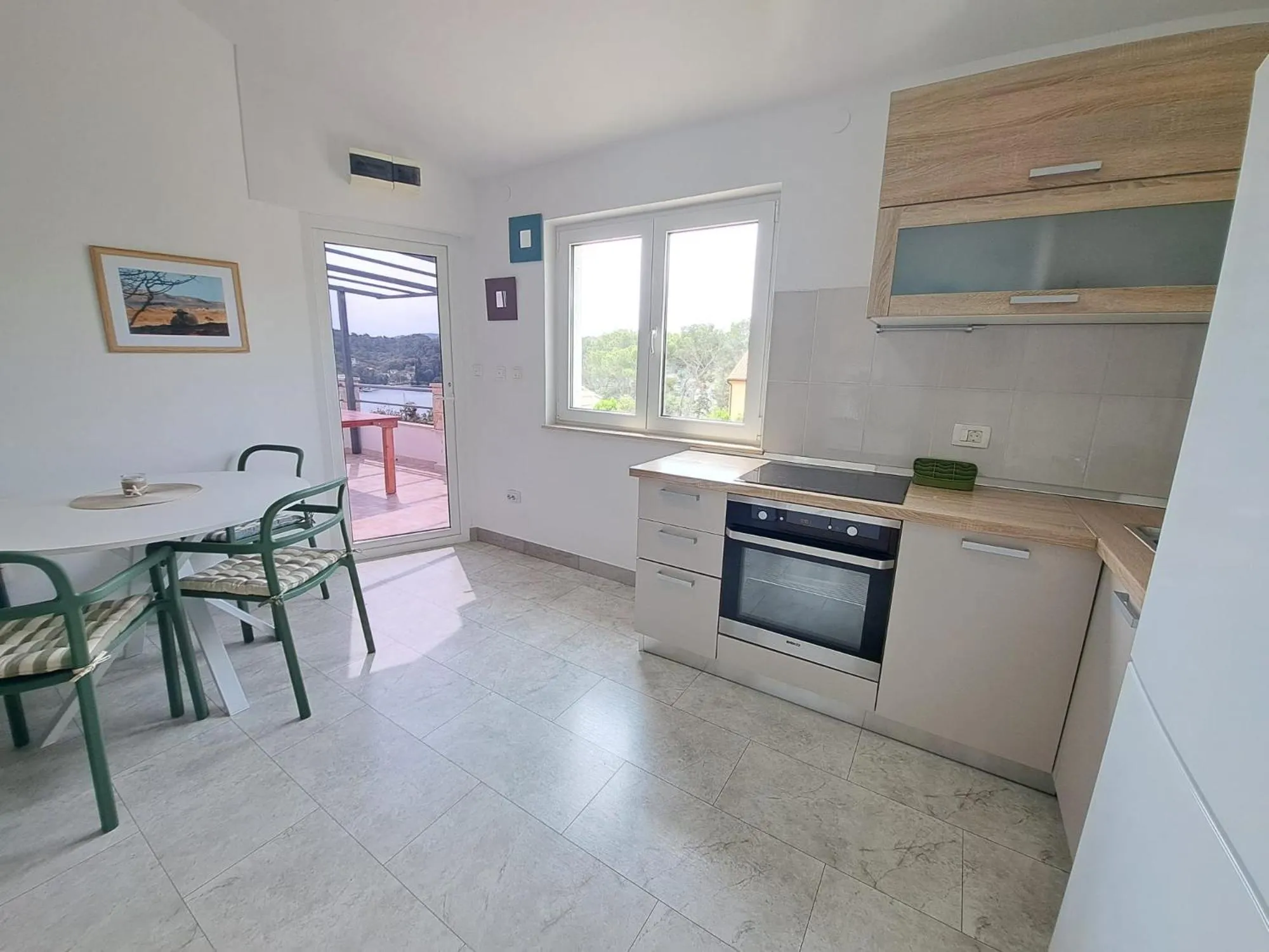 Kitchen or kitchenette in Villa Porto