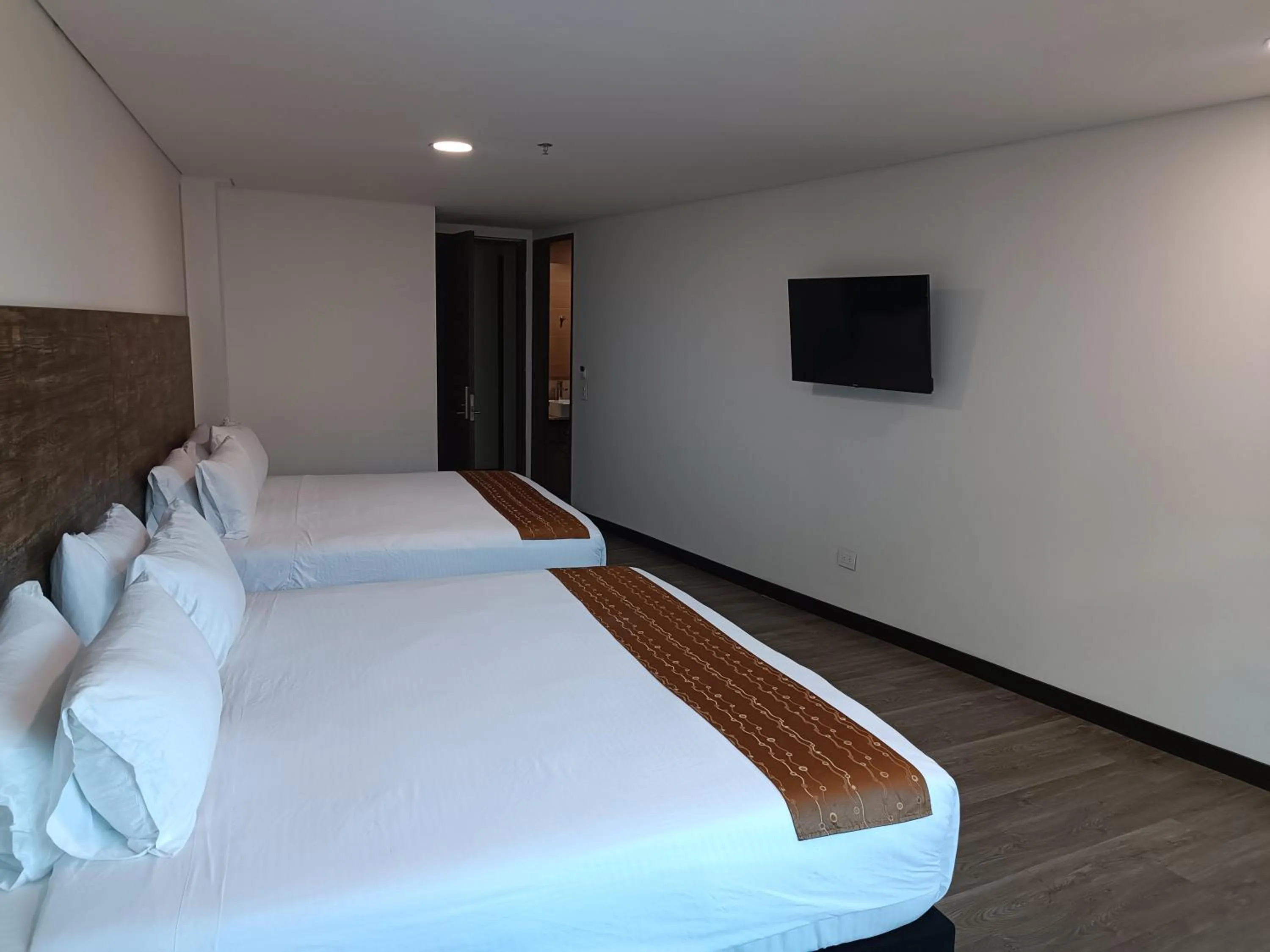 Bed in HOTEL AMERICAN VISA CORPORATE