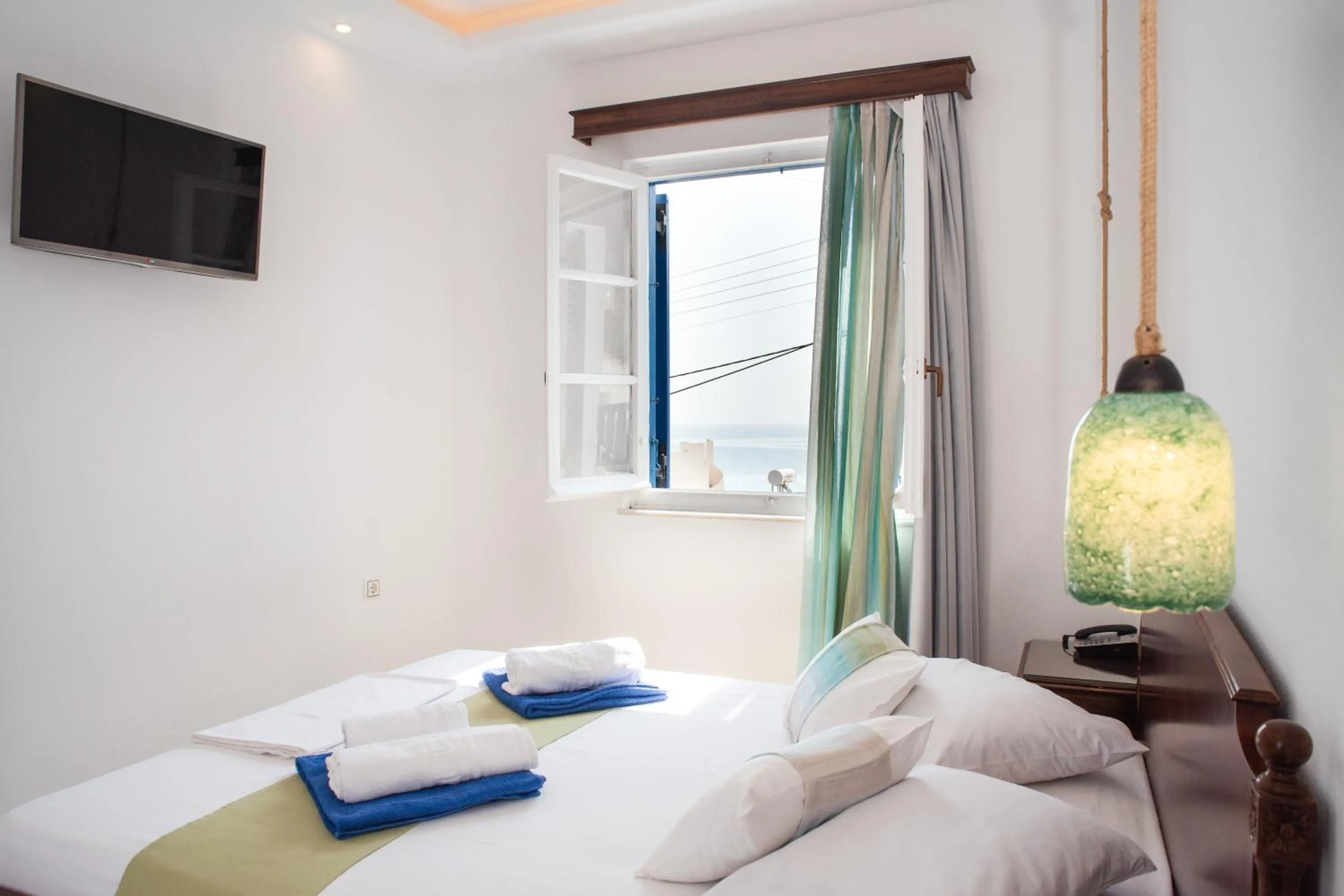 Bed in Adonis Hotel Naxos