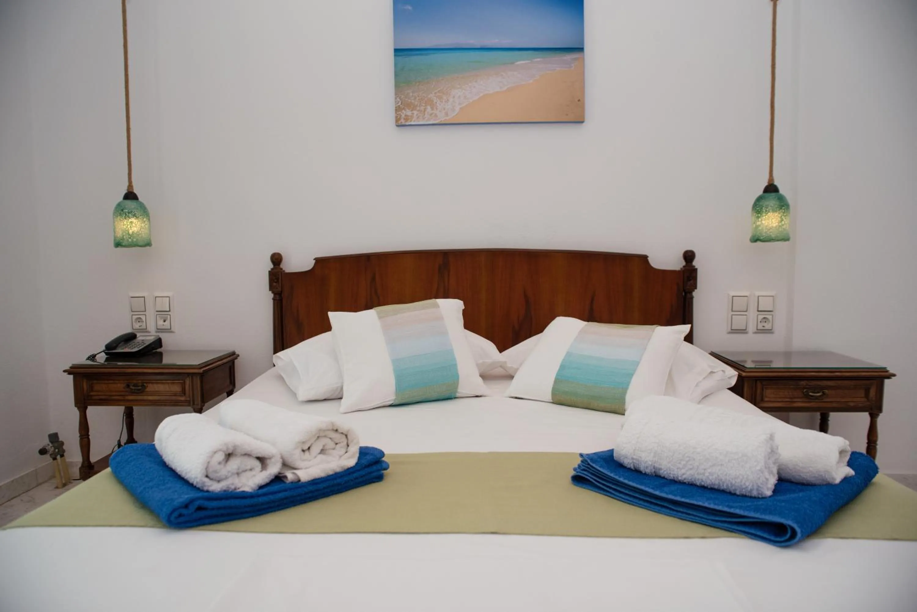 Bed in Adonis Hotel Naxos