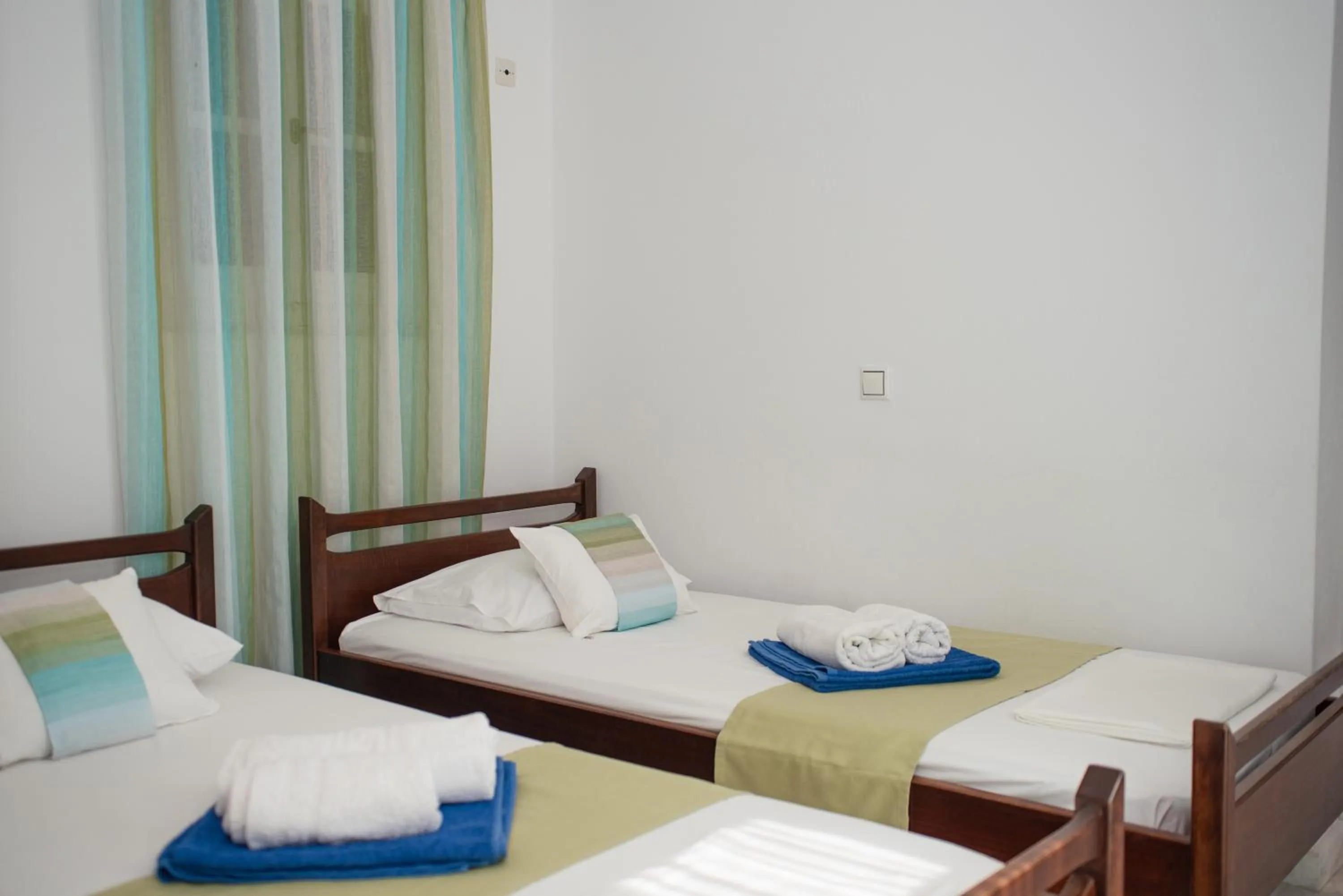 Bed in Adonis Hotel Naxos
