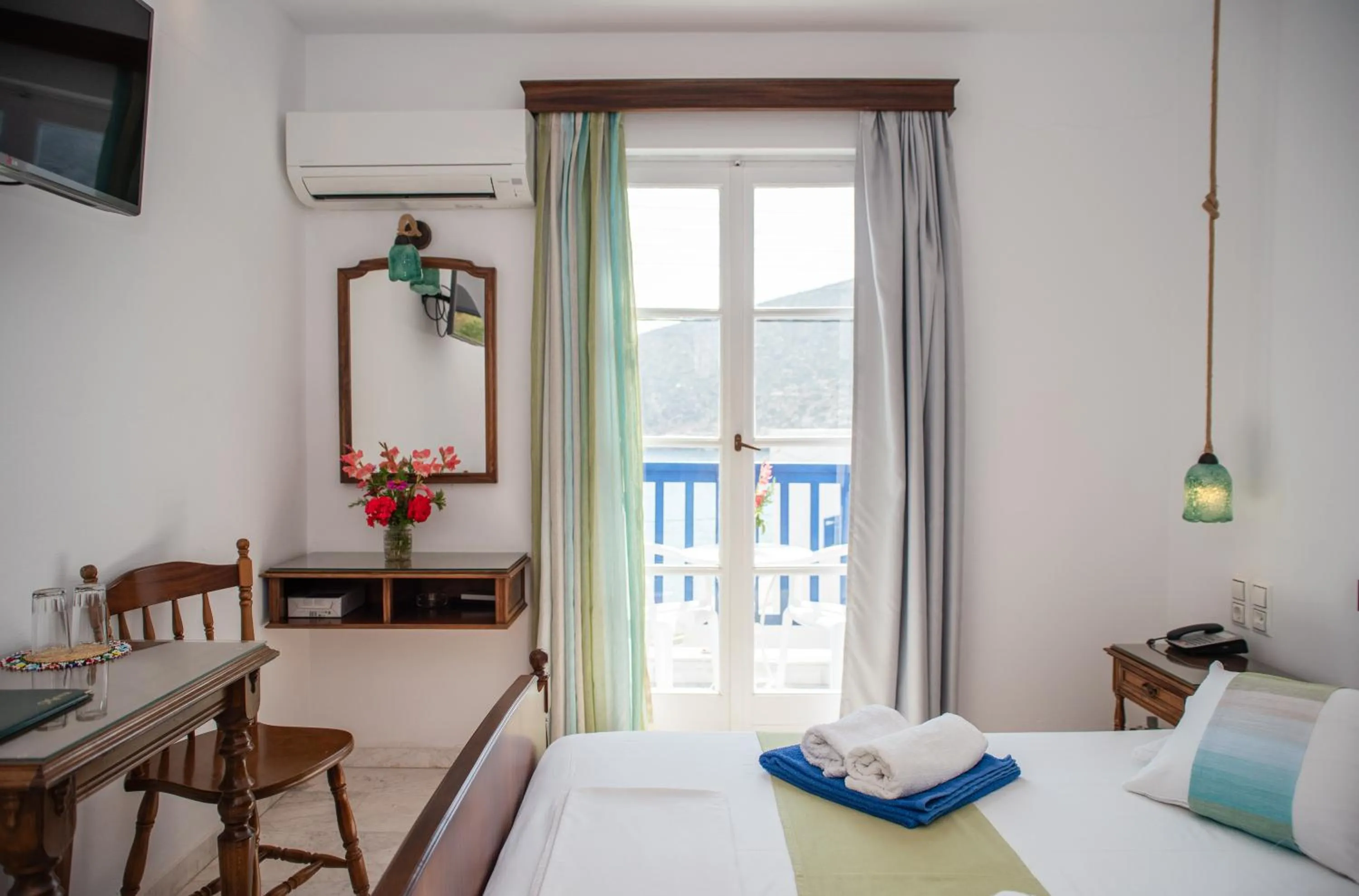 Bed in Adonis Hotel Naxos