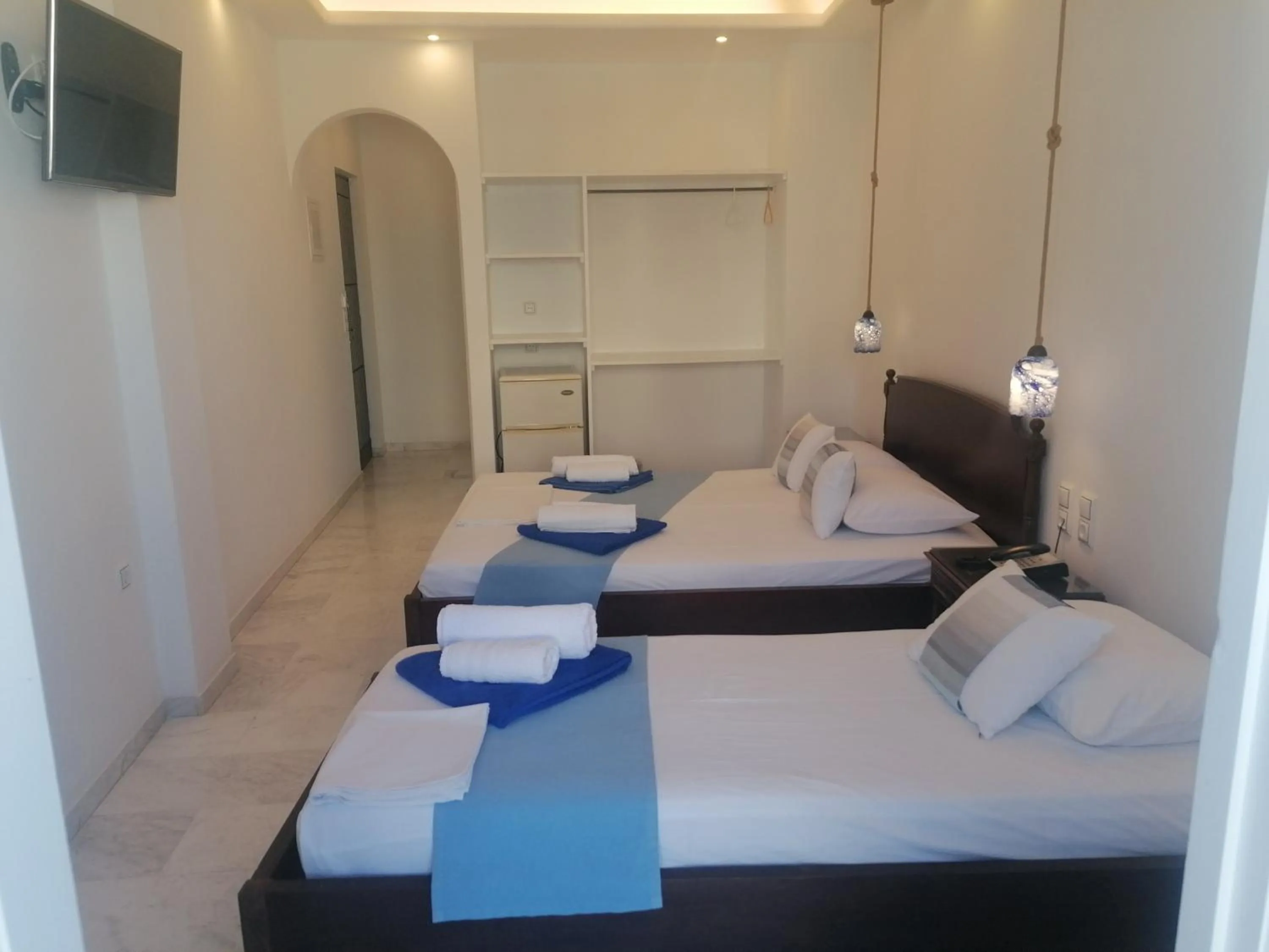 Bed in Adonis Hotel Naxos