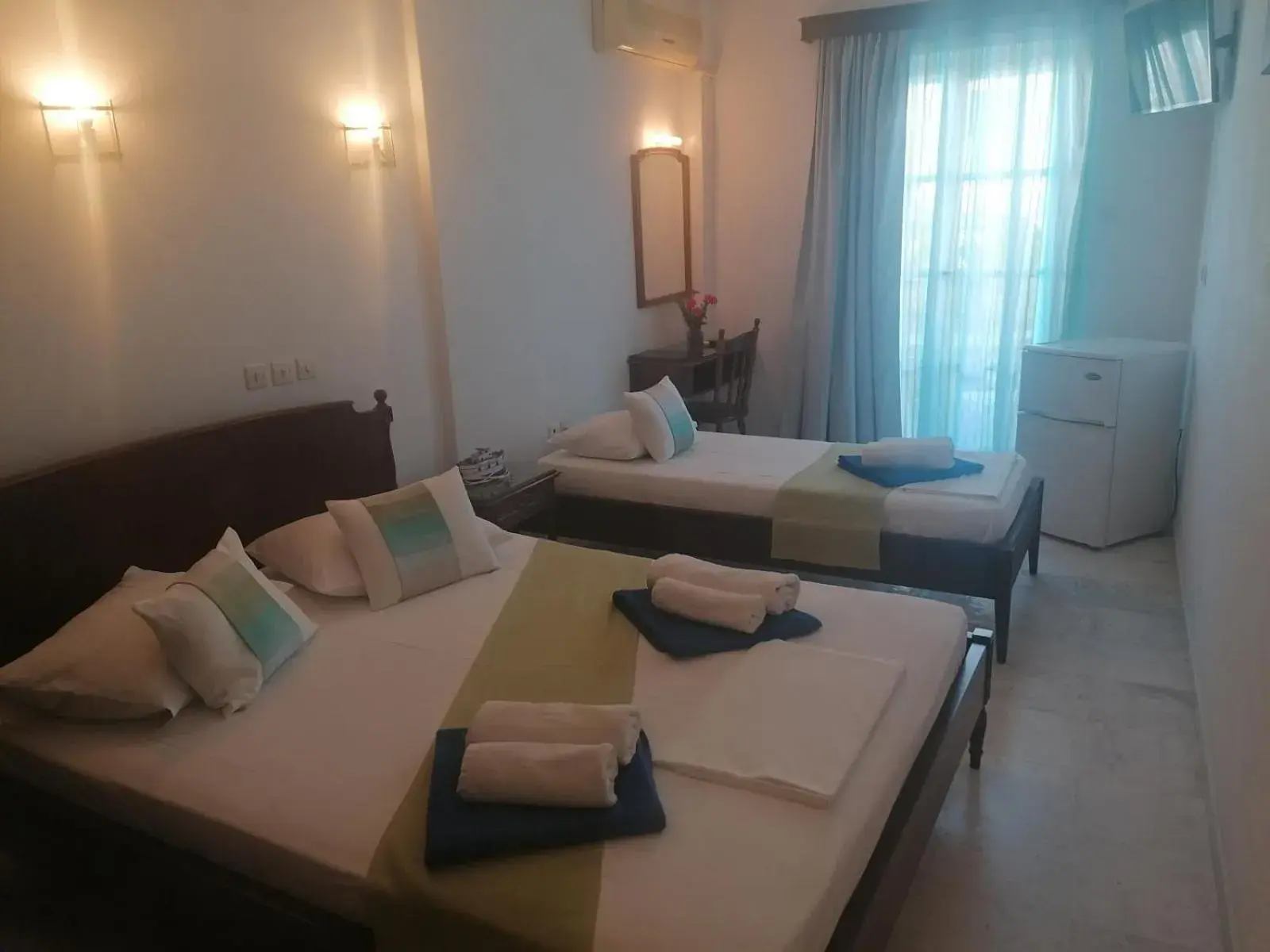 Triple Room with Garden View in Adonis Hotel Naxos Triple Room with Garden View in Adonis Hotel Naxos