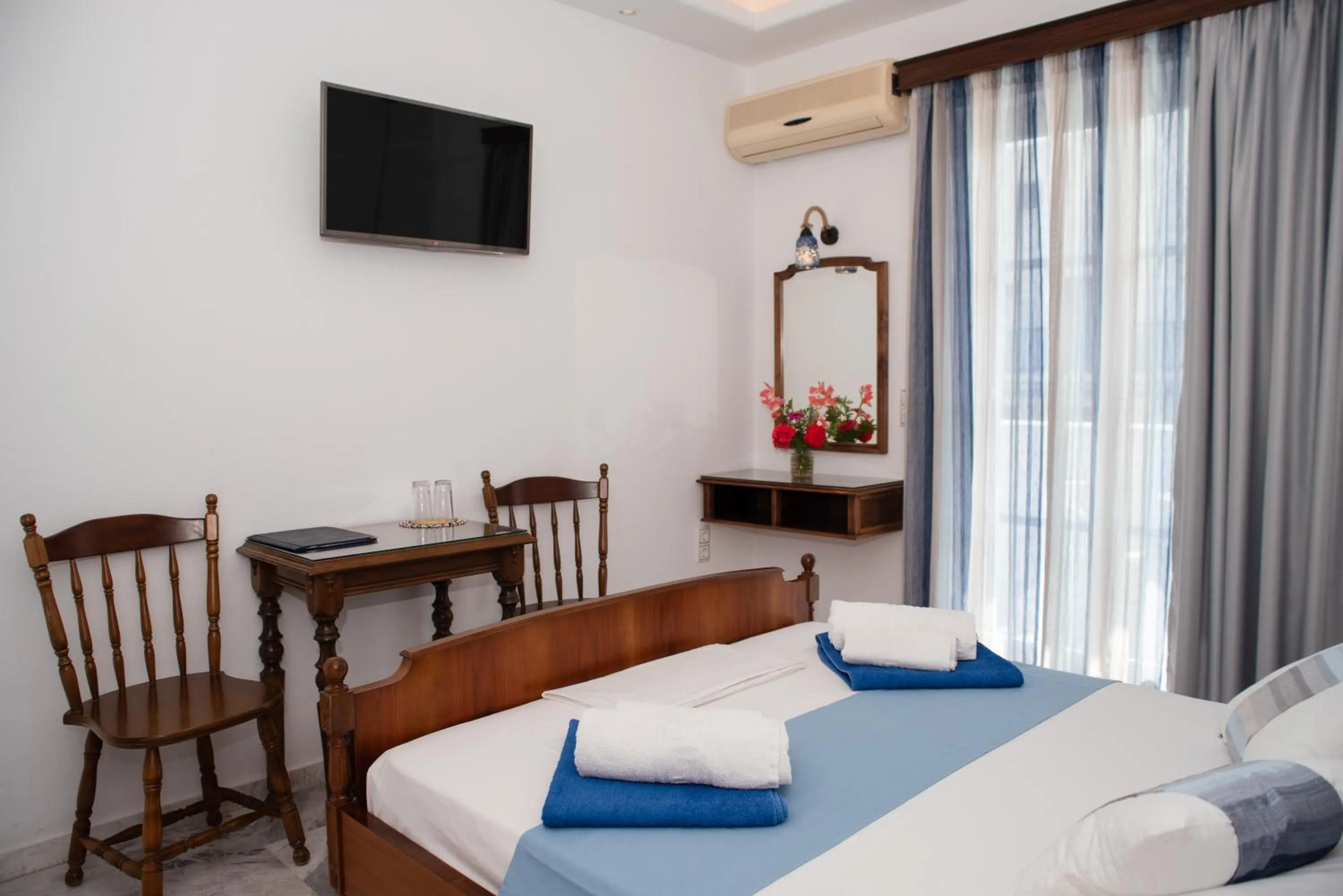 Bed in Adonis Hotel Naxos