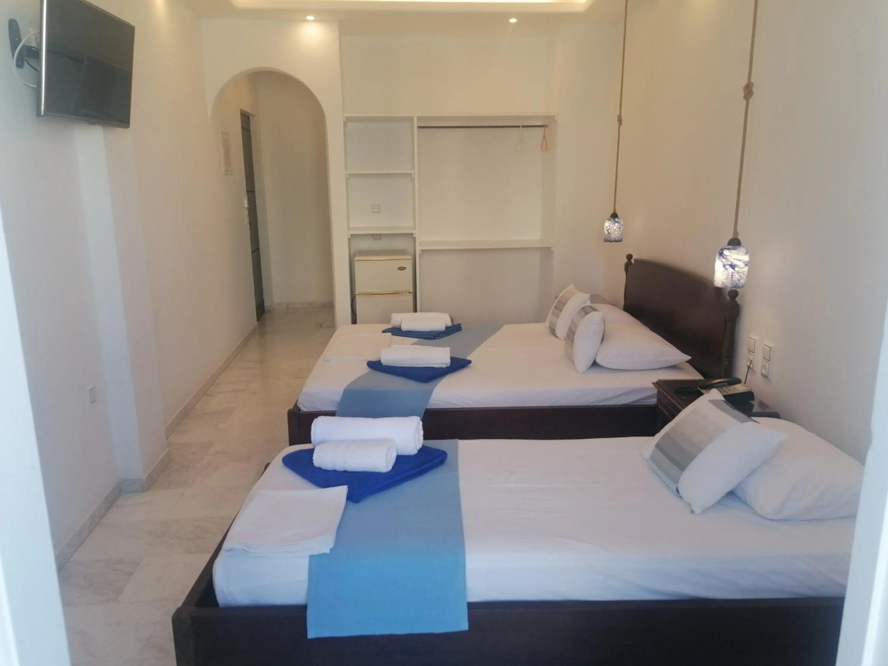 Bed in Adonis Hotel Naxos