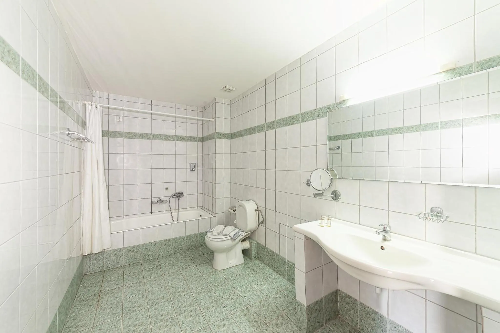 Toilet in Olympic Suites