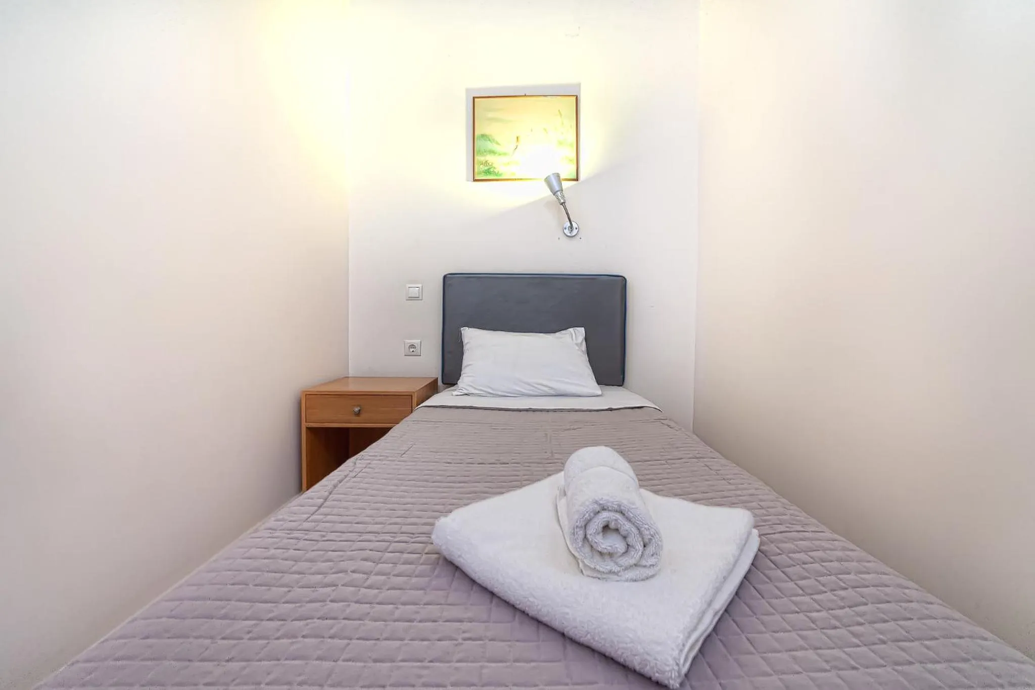 Bed in Olympic Suites