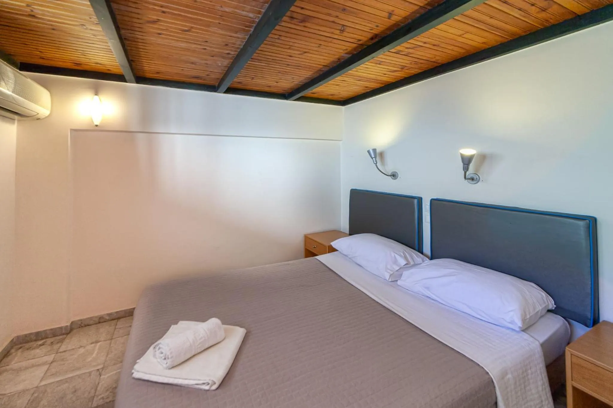 Bed in Olympic Suites