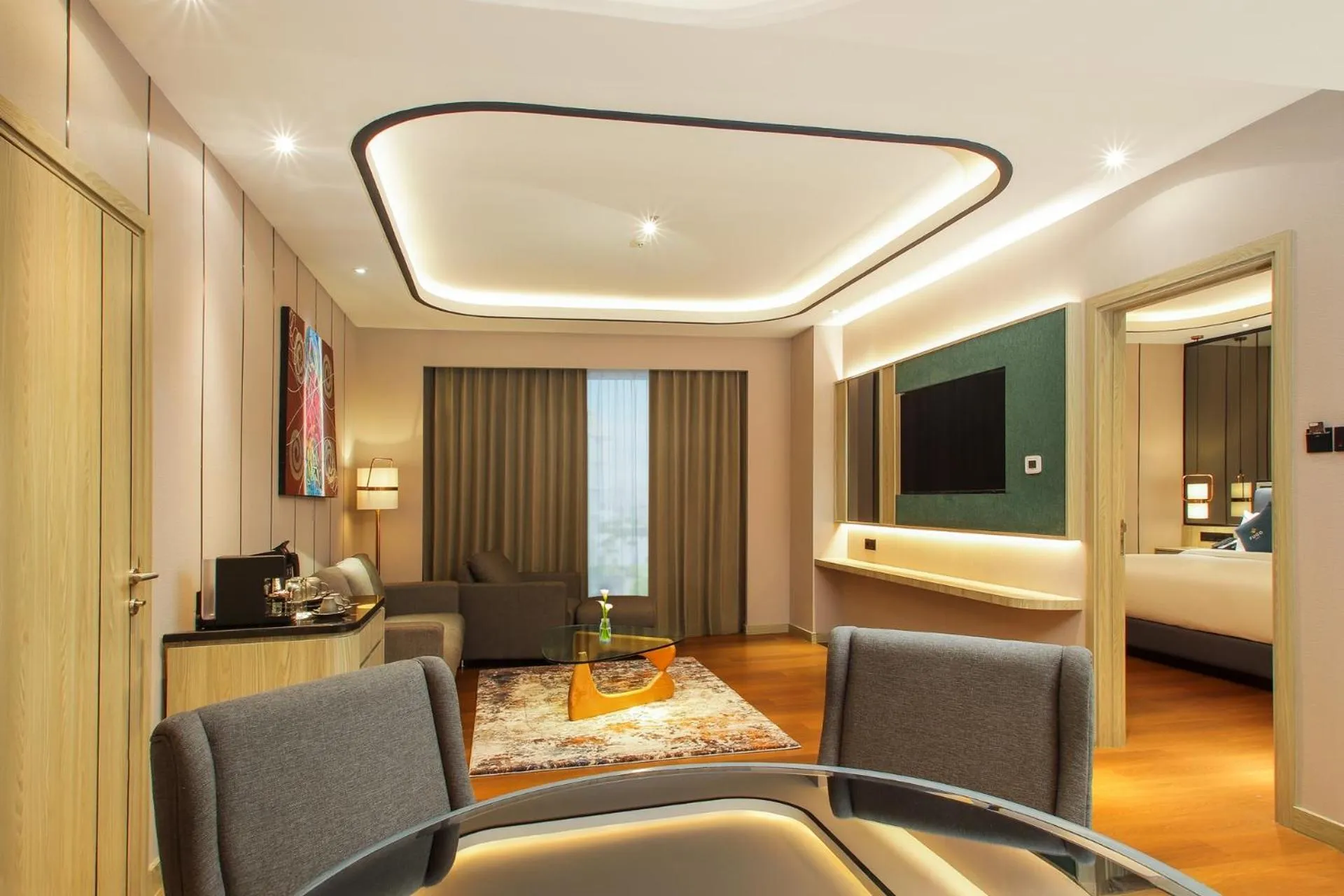 Living room, Bed in FUGO Hotel Banjarmasin