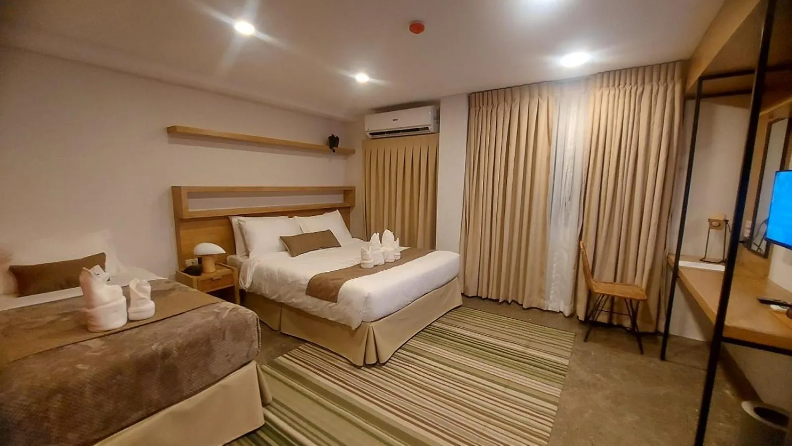 Bed in Prince Express Inn