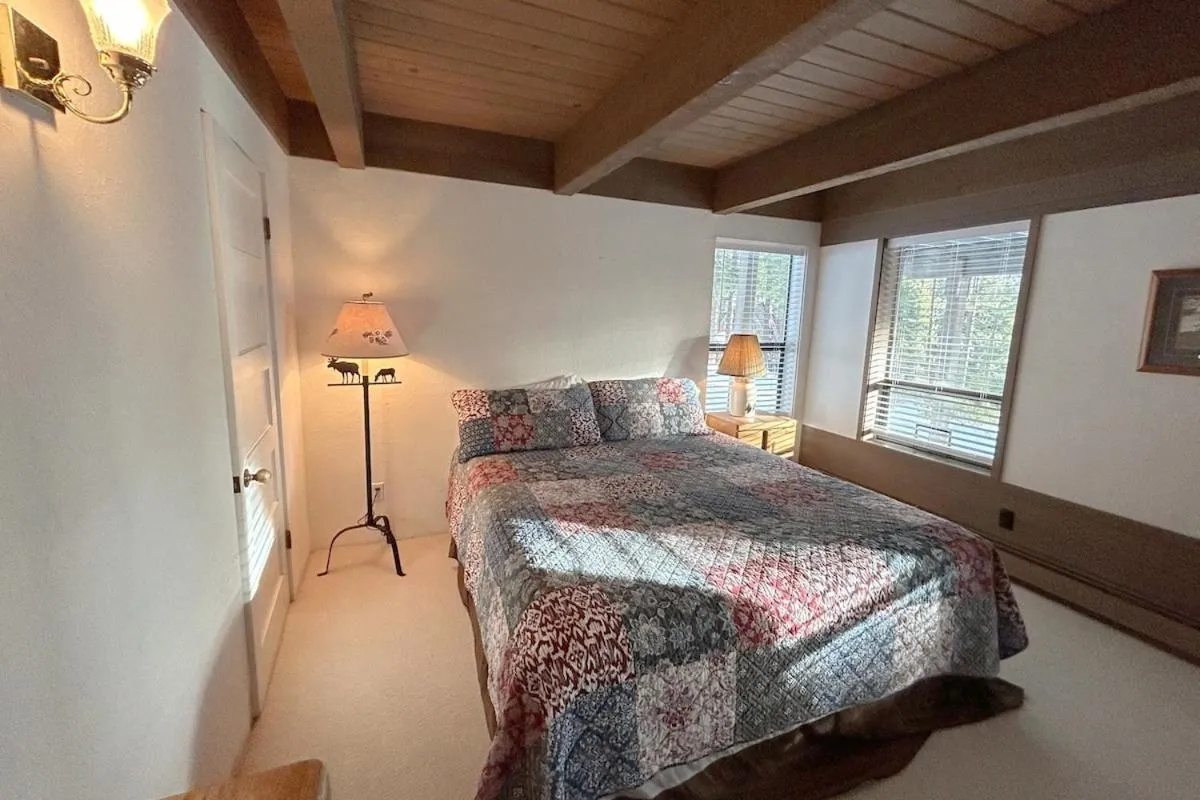 Bed in Tumbleweed Pines home