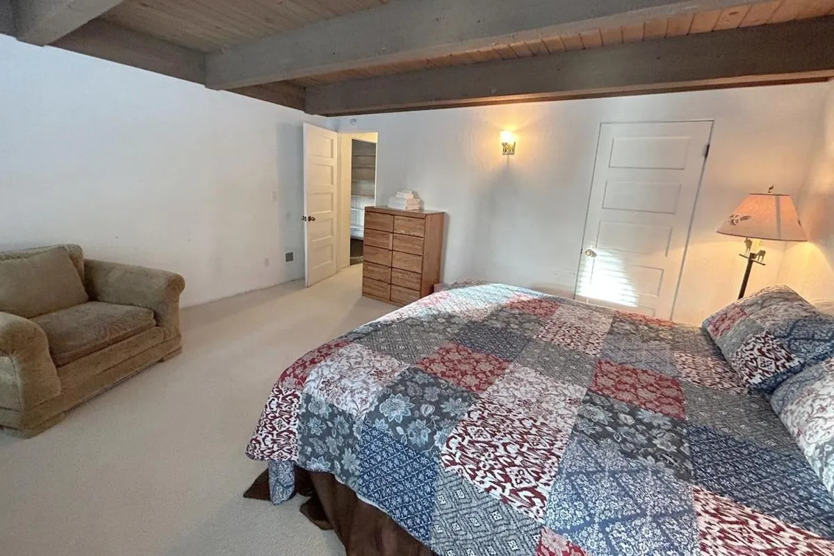 Bed in Tumbleweed Pines home