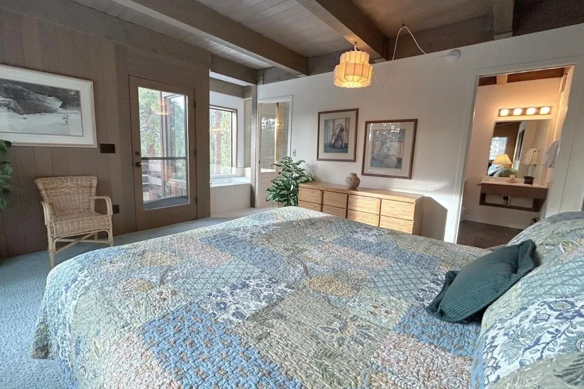 Bed in Tumbleweed Pines home