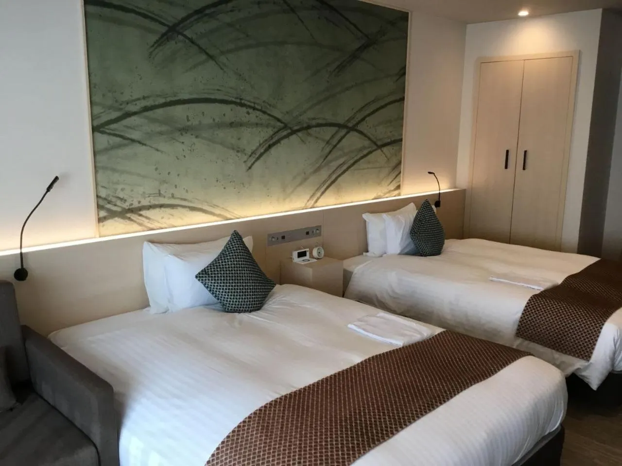 Photo of the whole room, Bed in Odysis Suites Osaka Airport Hotel