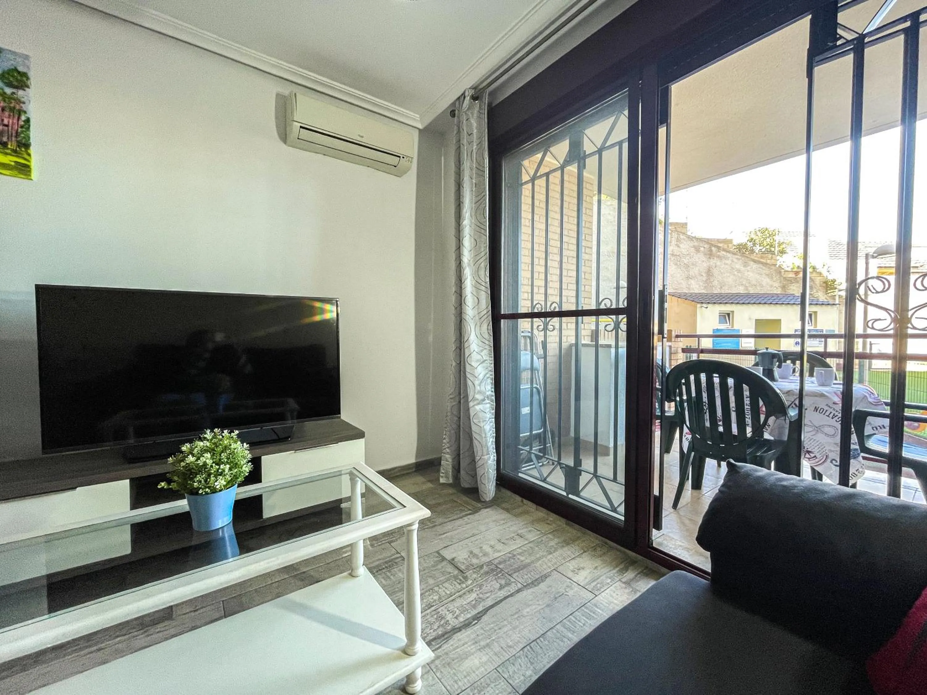 TV and multimedia in Apartamentos Mirador del Castillo 3000