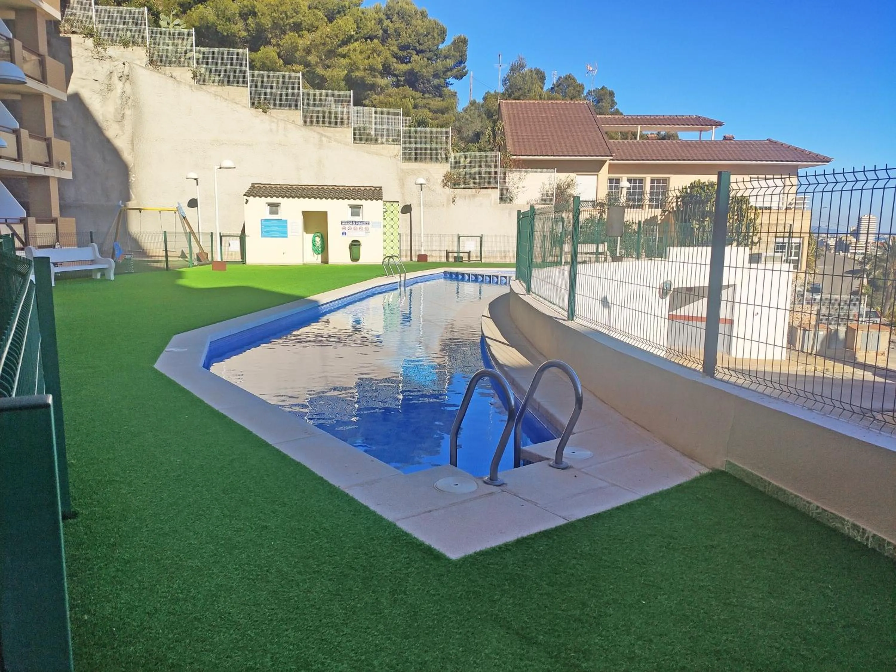 Swimming pool in Apartamentos Mirador del Castillo 3000