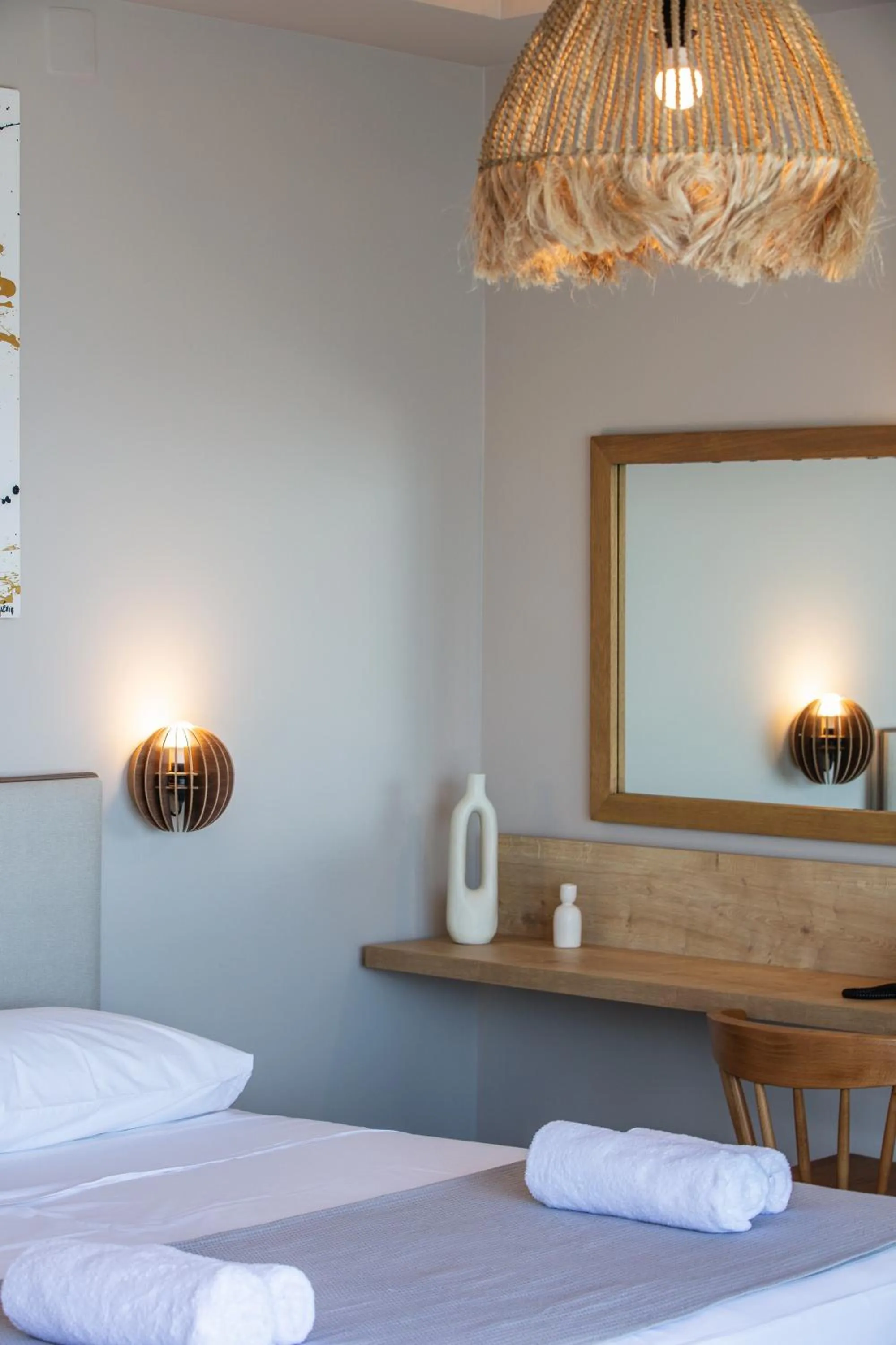 Bed in Skipper Beachfront Suites