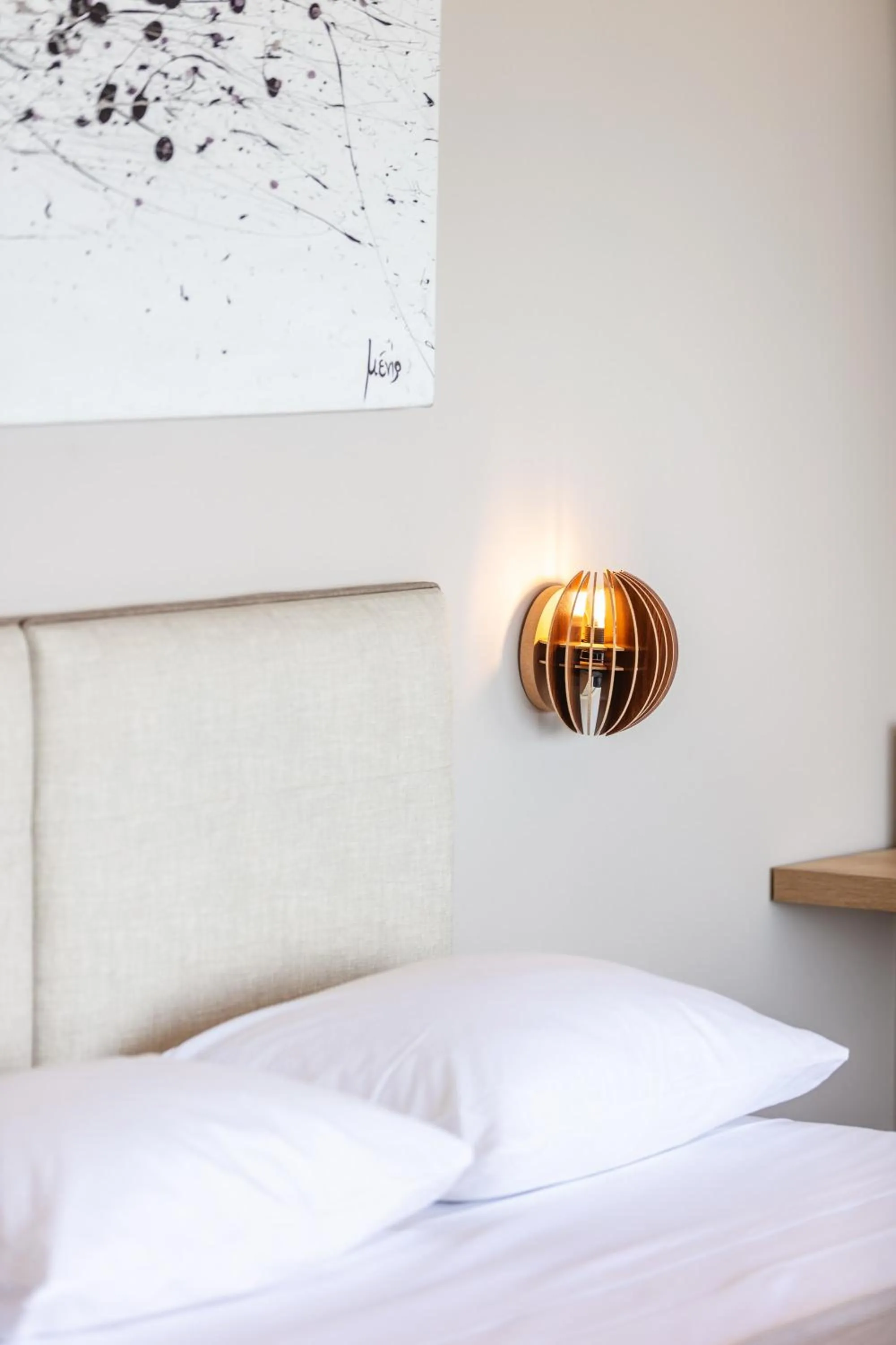 Bed in Skipper Beachfront Suites