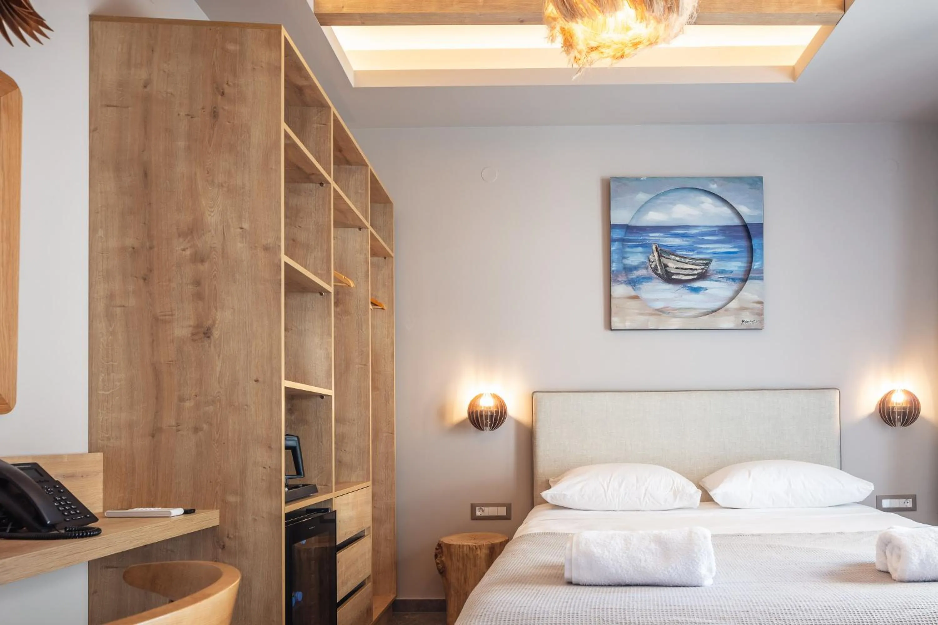 Bed in Skipper Beachfront Suites