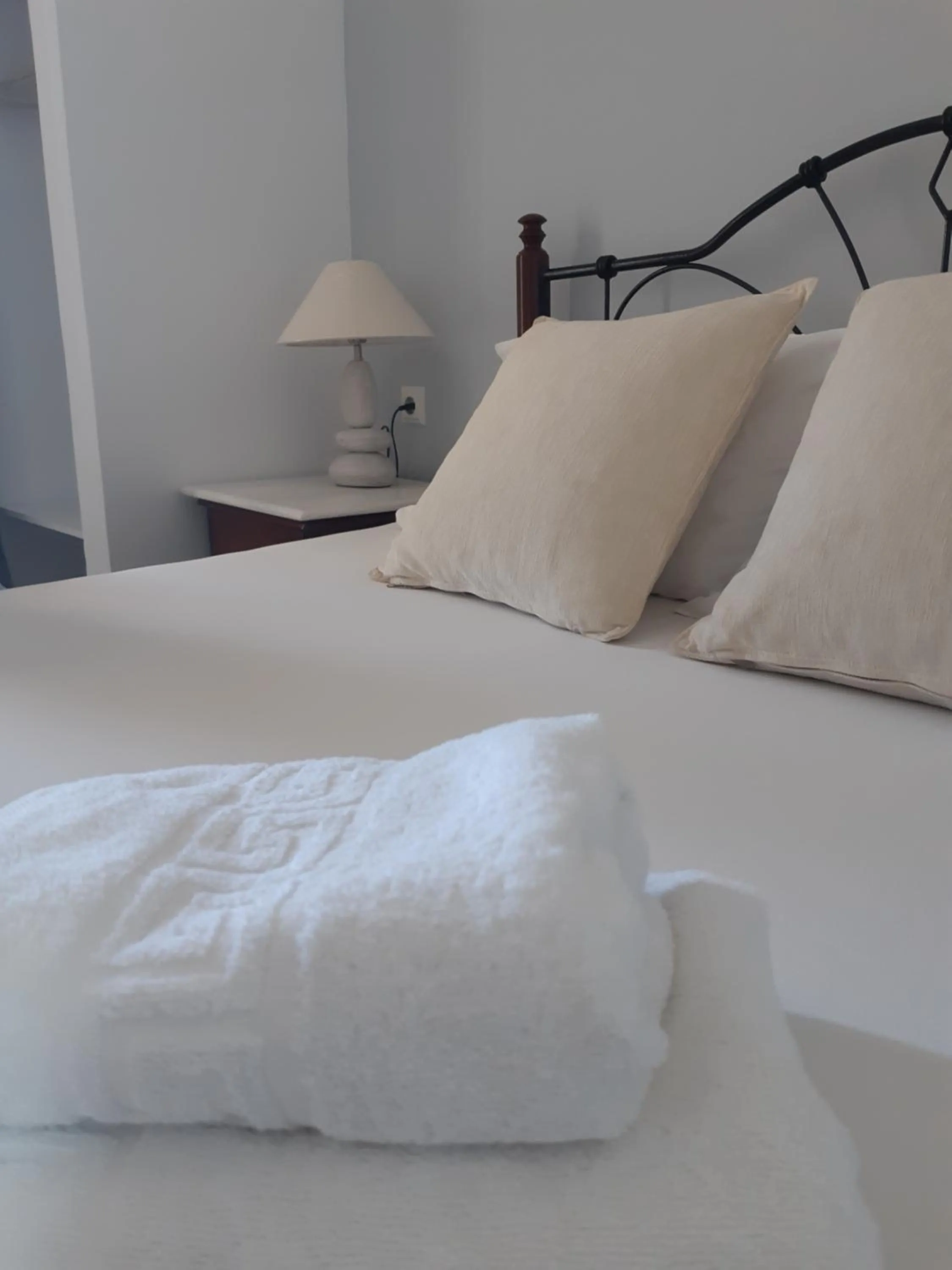 Bed in Emmanouela Studios & Villas