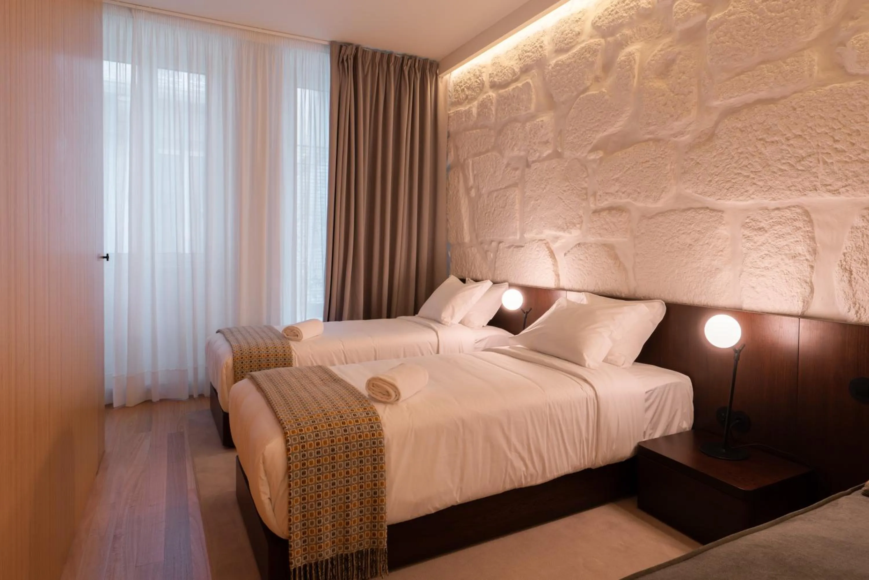 Bedroom in d'ALMA Boutique Hotel