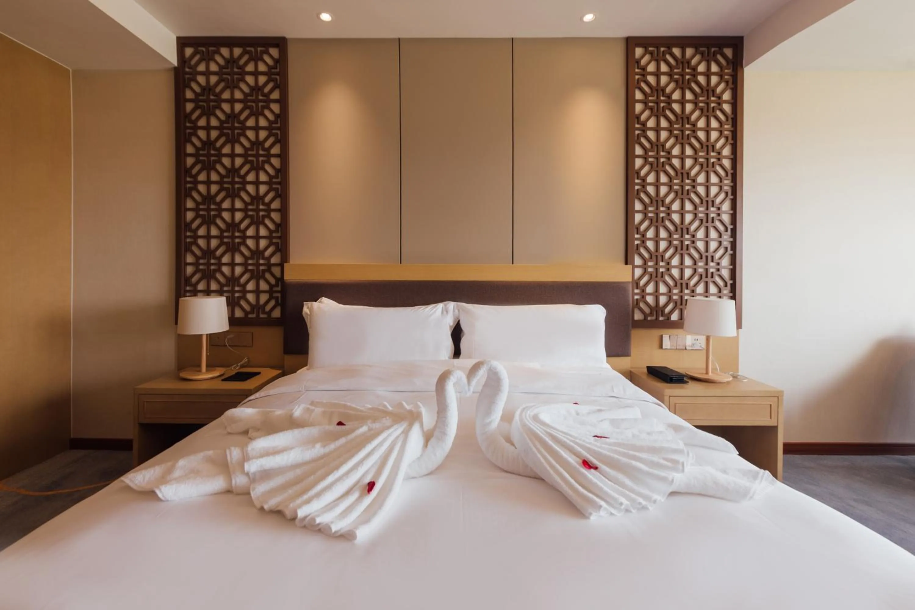 Bed in White Swan Guest House MeiZhou