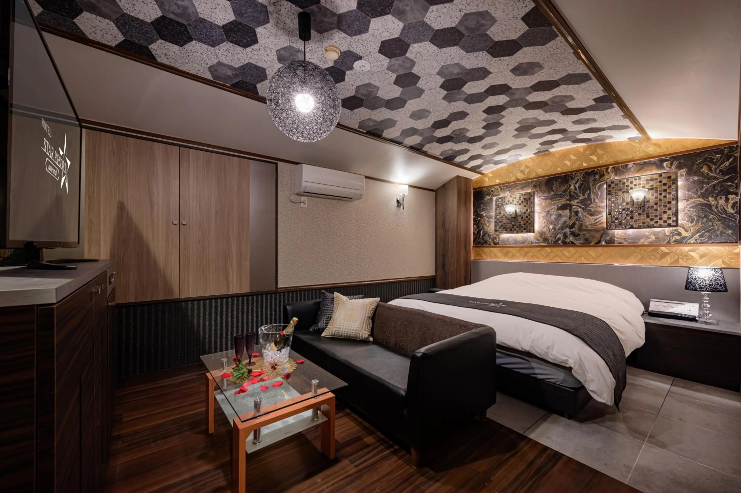 Bed in HOTEL STAR RESORT aroma