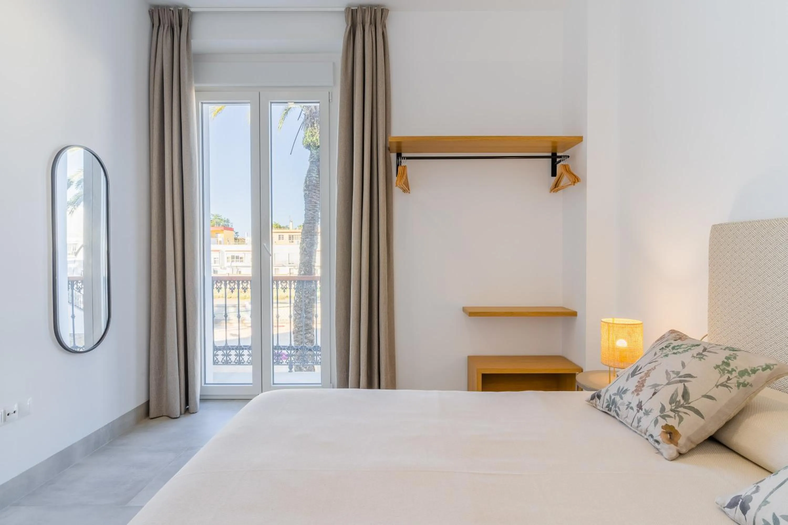 Bed in CASA DE LA VEGA SUITES