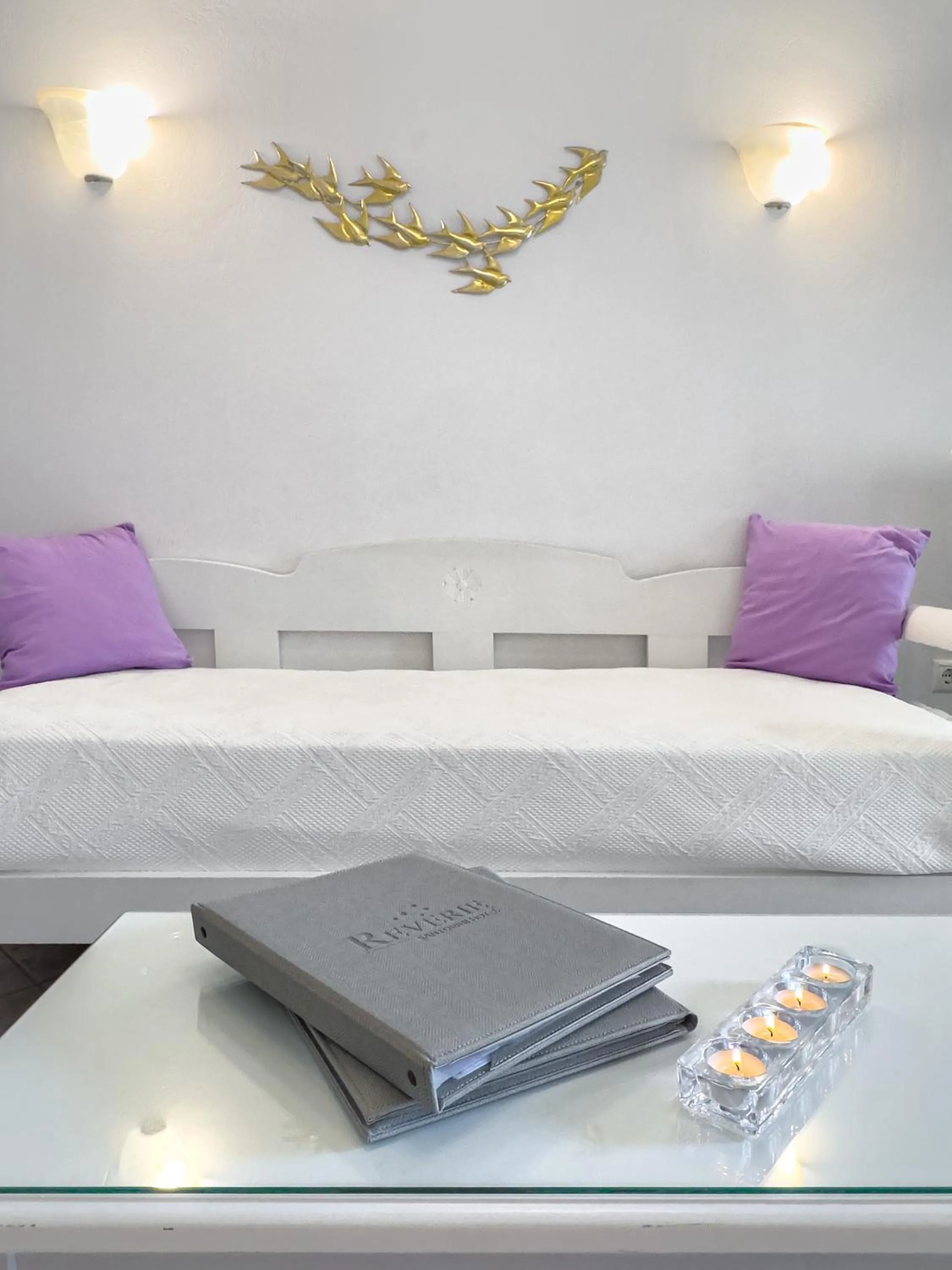 Bed in Reverie Santorini Hotel