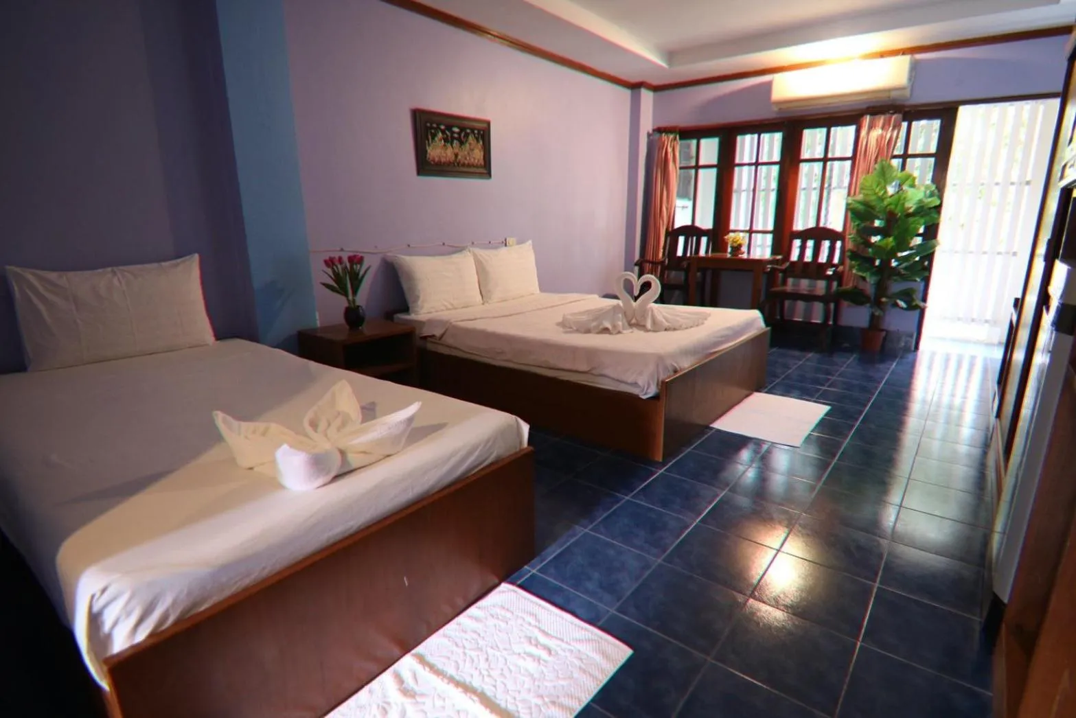 Bed in Coconut House Resort