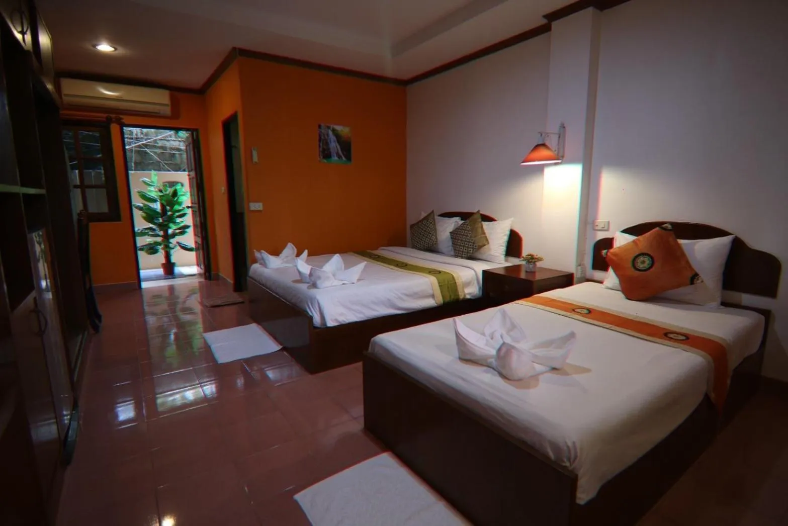 Bed in Coconut House Resort