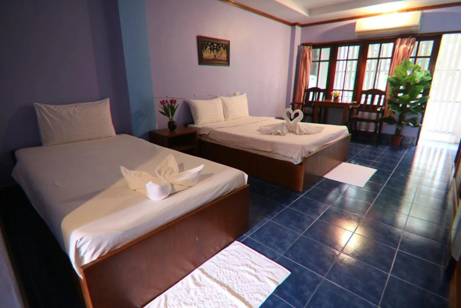 Bed in Coconut House Resort