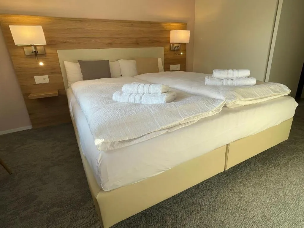 Bed in Aparthotel Krone - Self Check-In