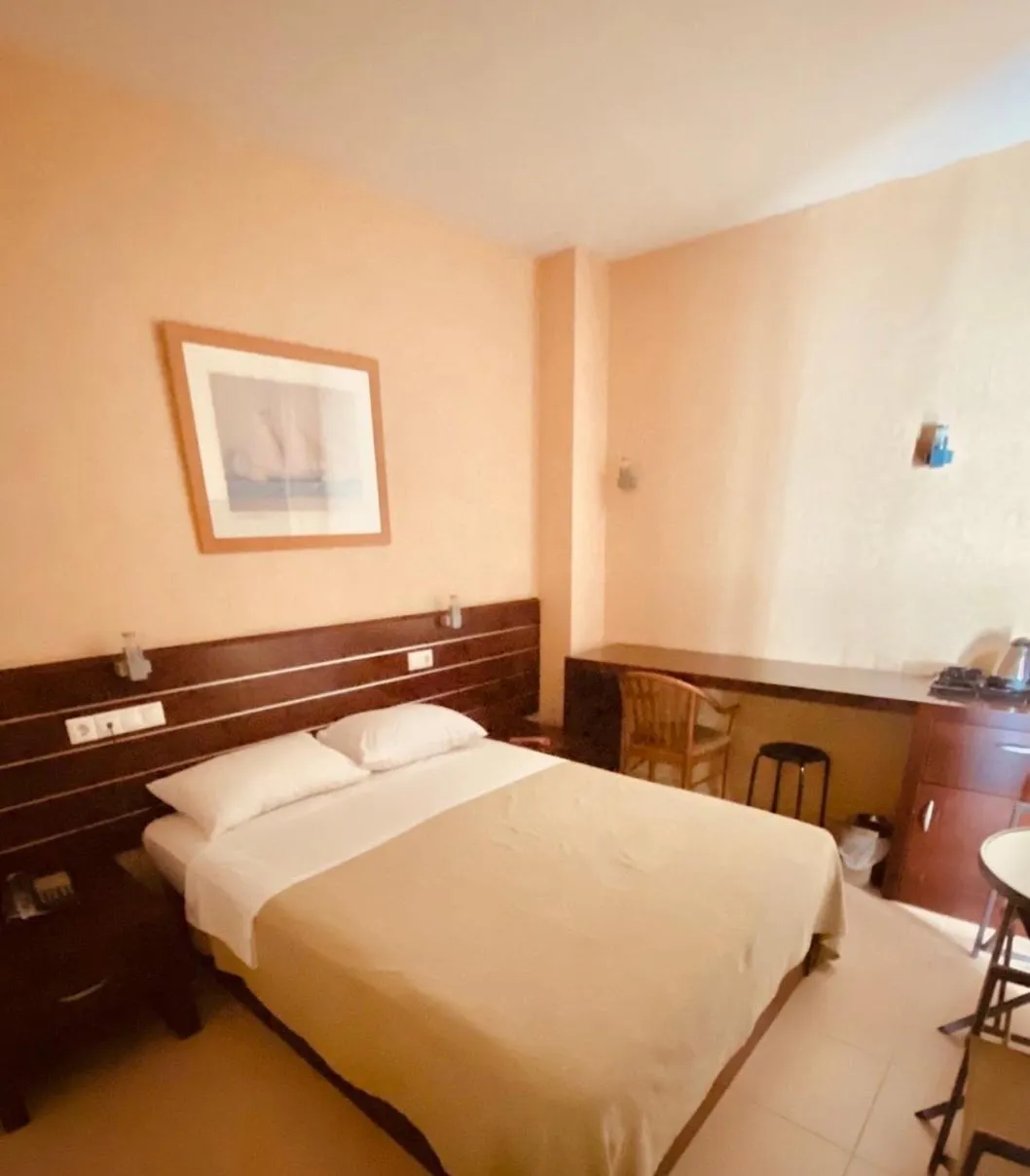 Bed in Saint George Hotel