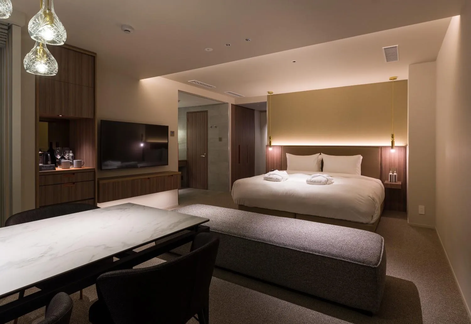Bed in THE skM TOKYO HOTEL & DINING