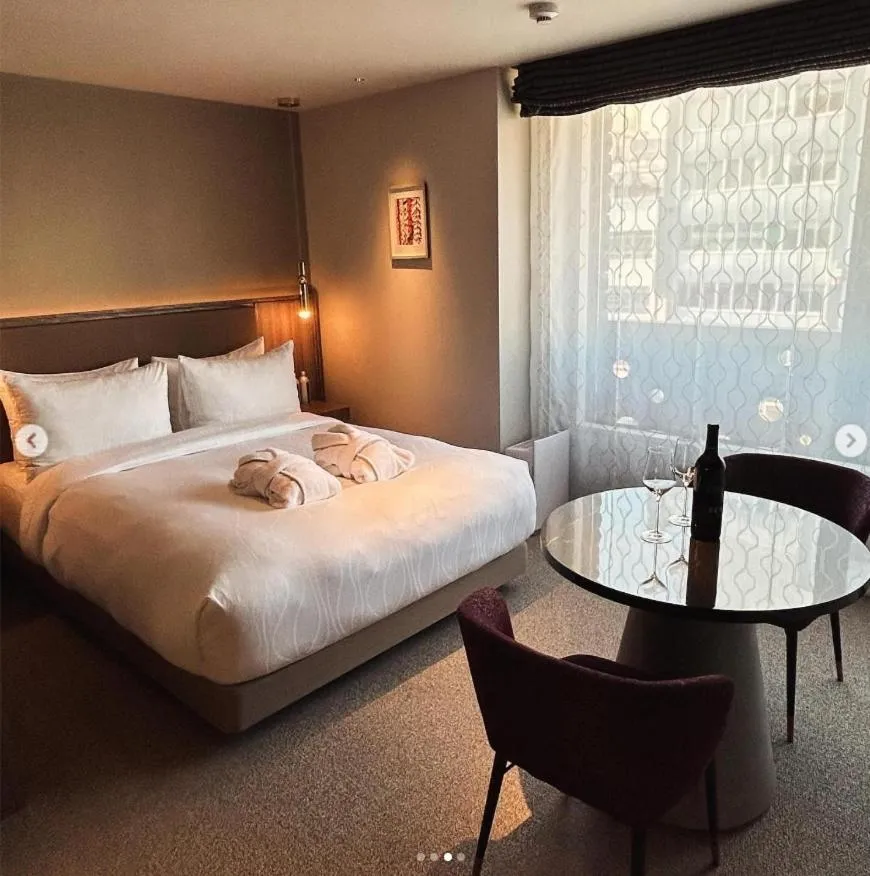 Bed in THE skM TOKYO HOTEL & DINING