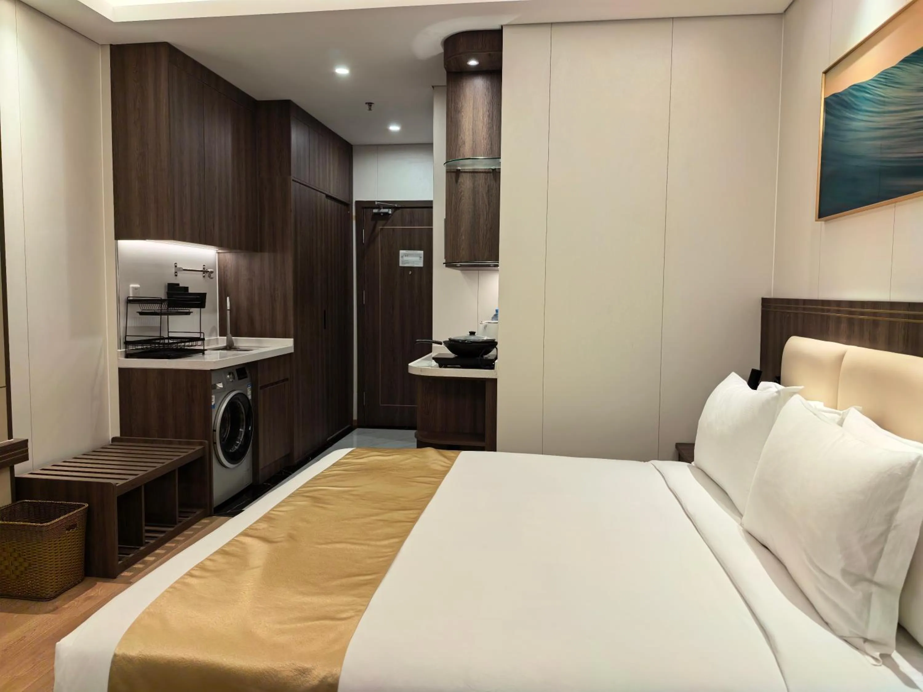 Bed in Escale International Hotel