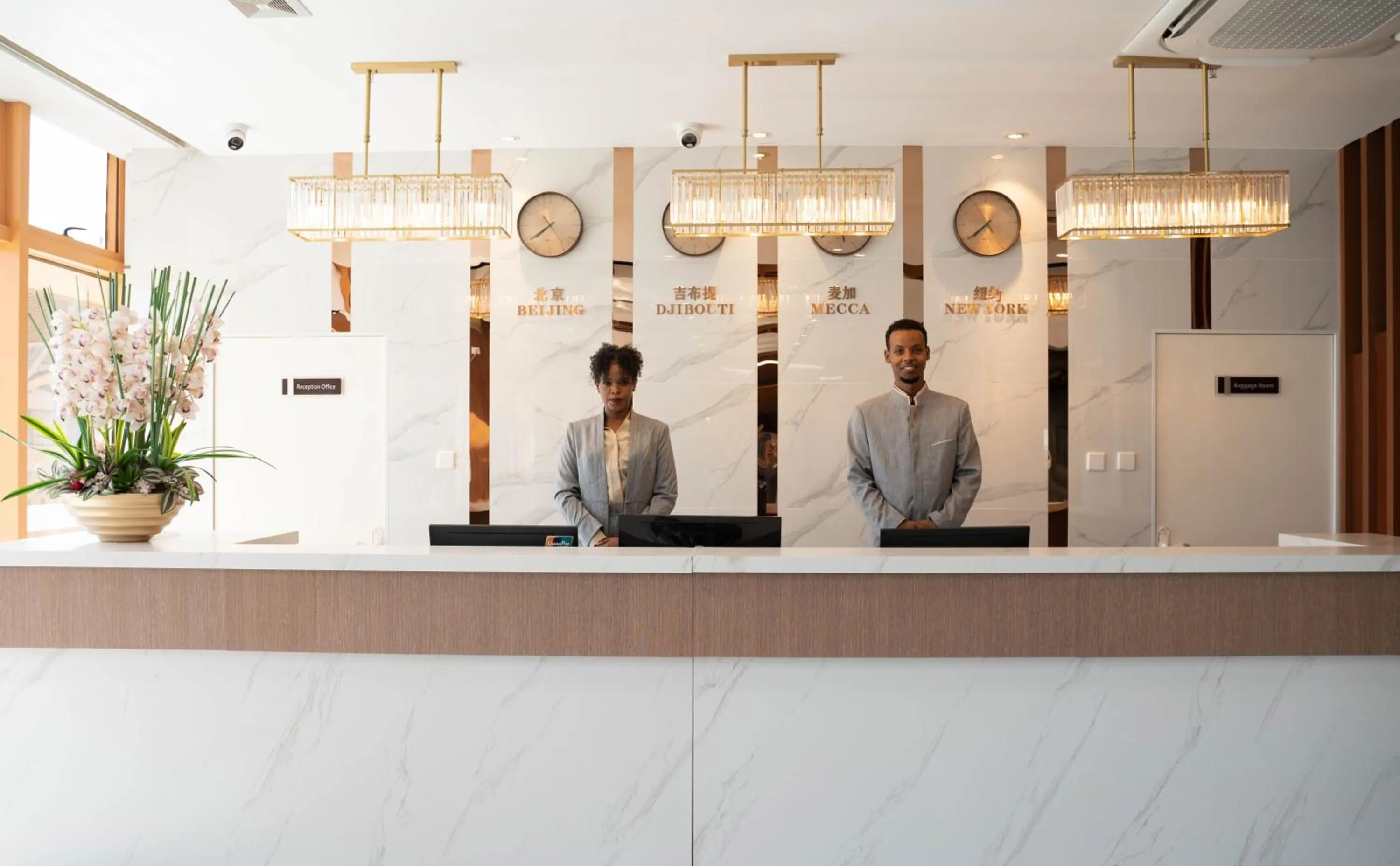 Lobby or reception in Escale International Hotel