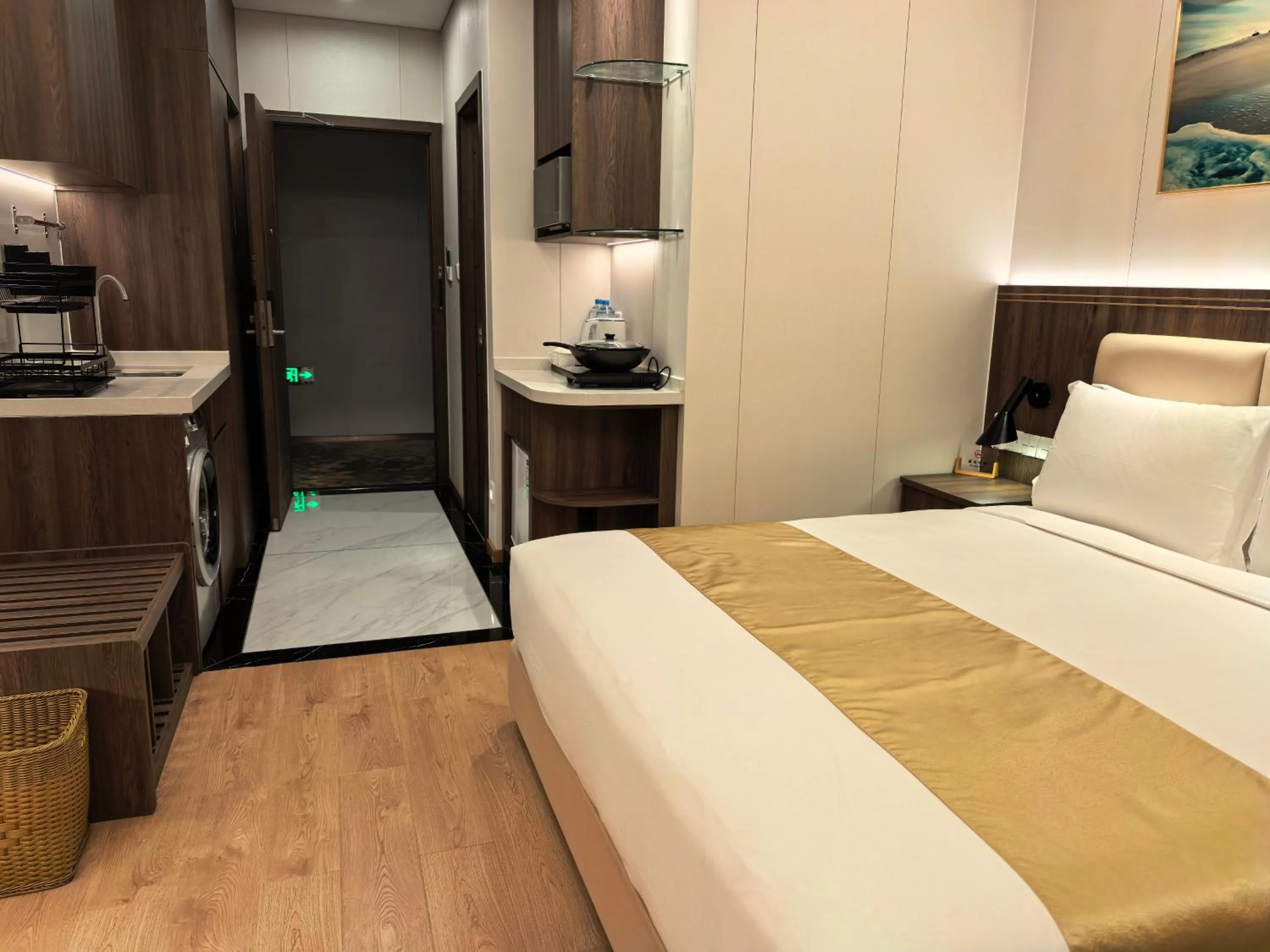 Bed in Escale International Hotel